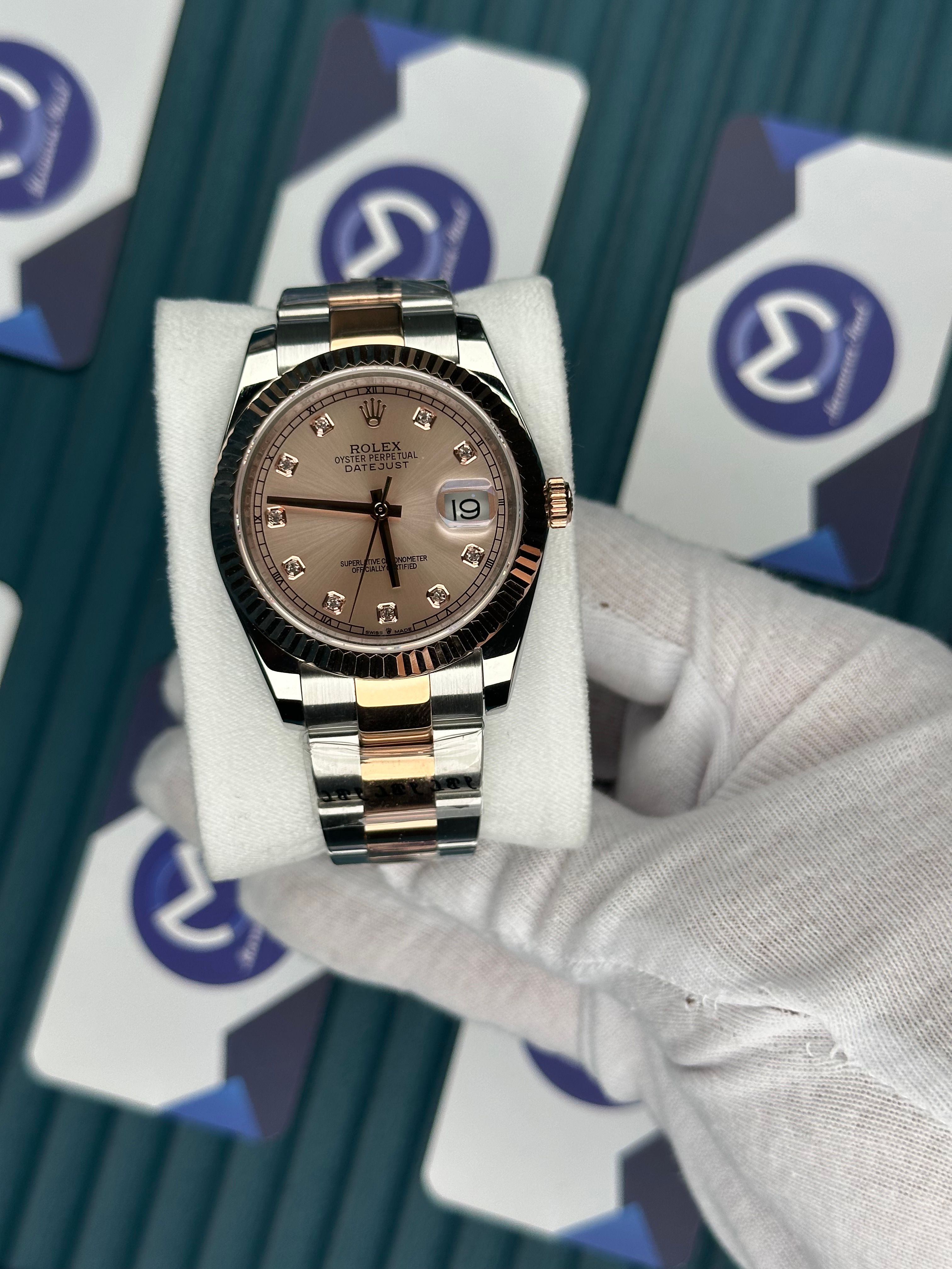 ROLEX DATEJUST CHAMPAGNE DIAL DIAMOND INDEX ROSE-SILVER OYSTER