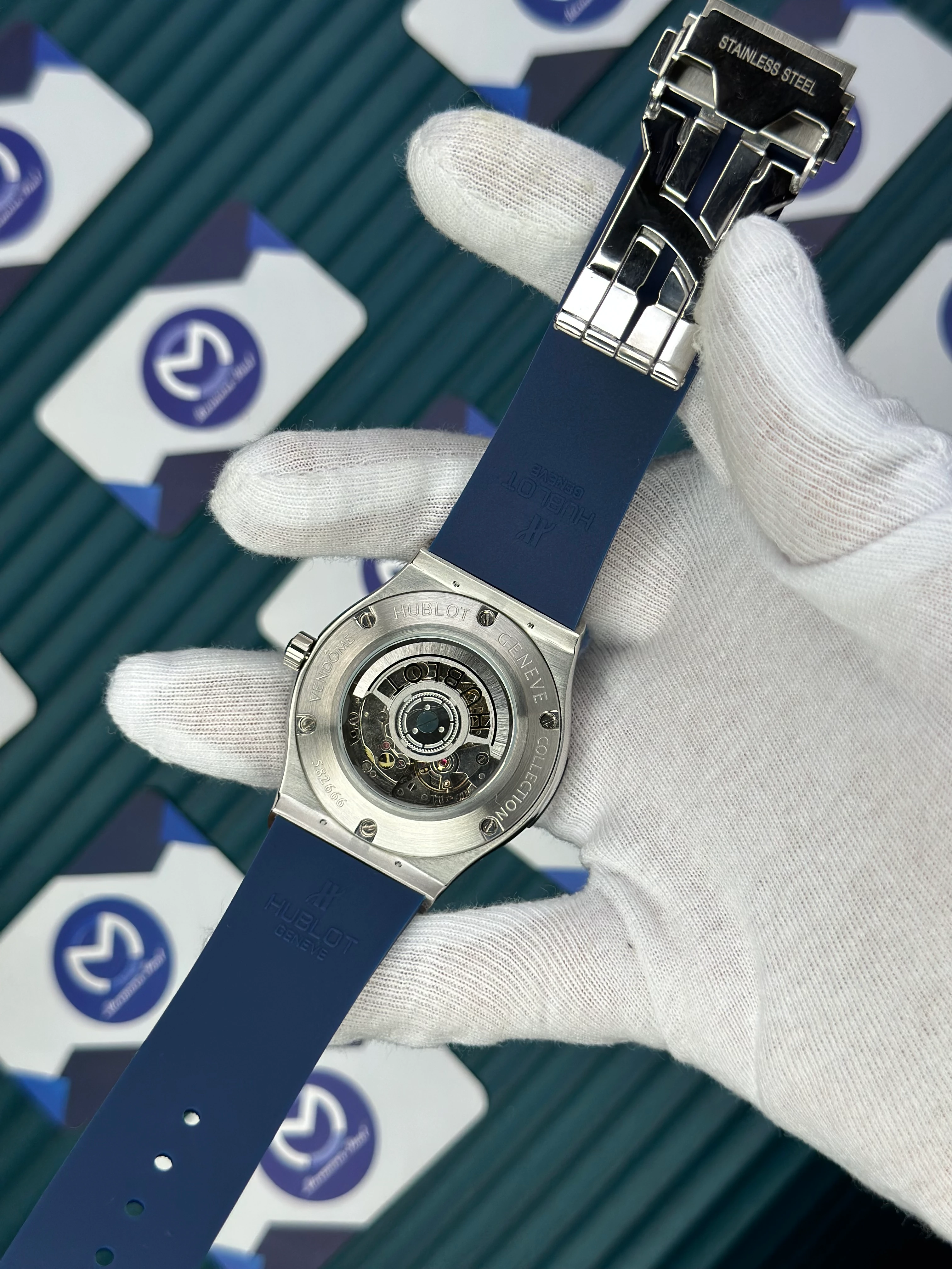HUBLOT GENEVE AUTOMATIC VENDOME BLUE DIAL SILVER CASE BLACK BEZEL BLUE RUBBER CORD