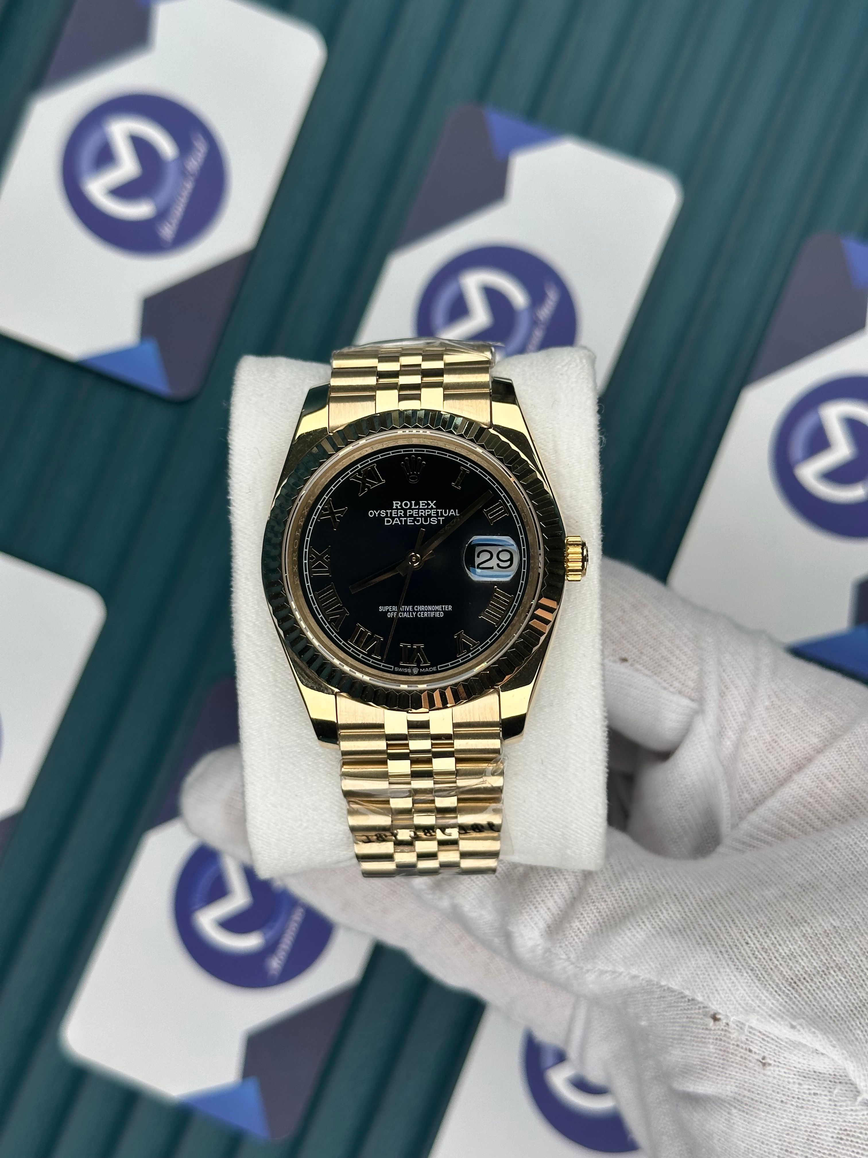 ROLEX DATEJUST BLACK DIAL ROMA INDEX GOLD JUBILE