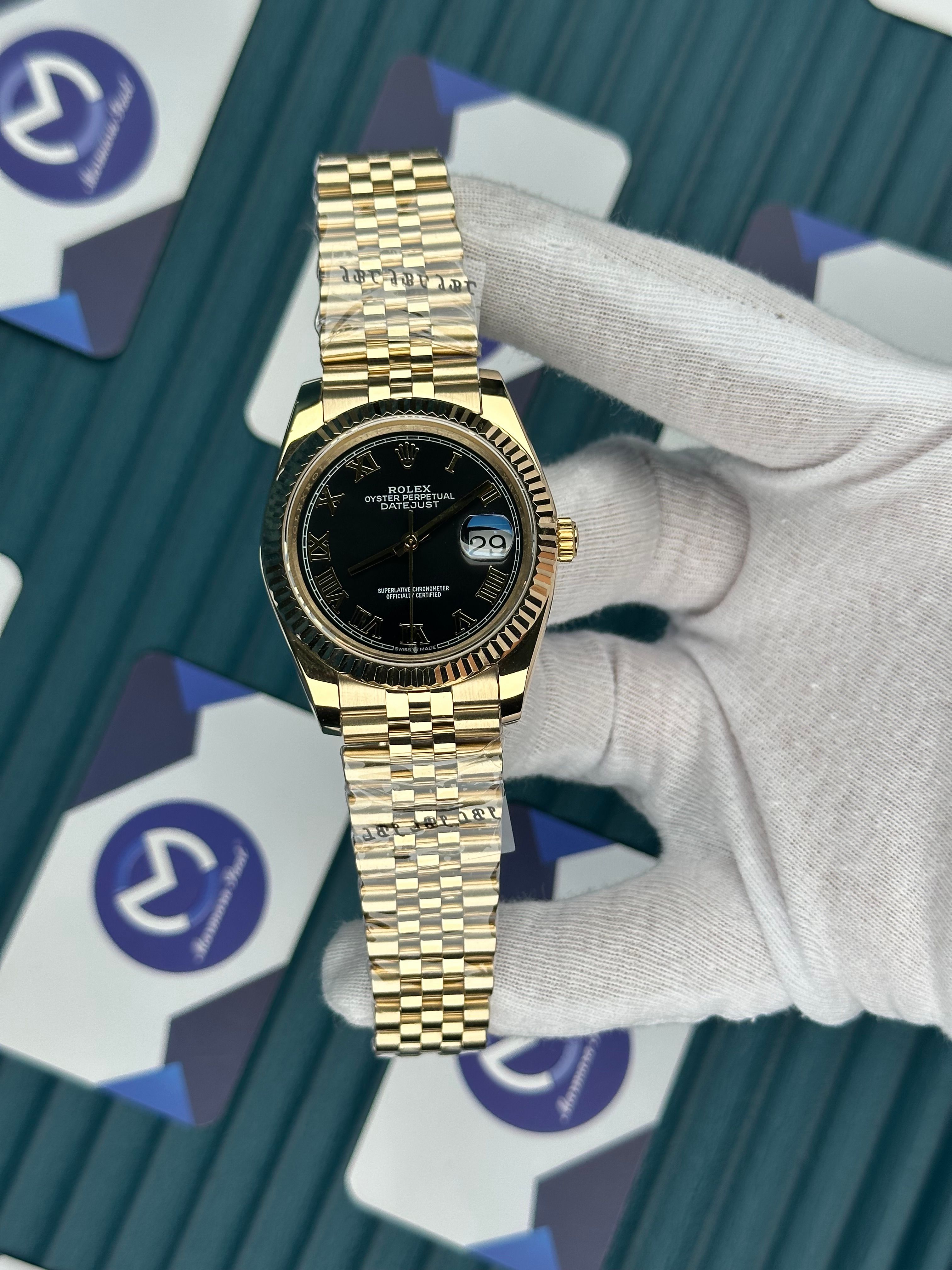 ROLEX DATEJUST BLACK DIAL ROMA INDEX GOLD JUBILE