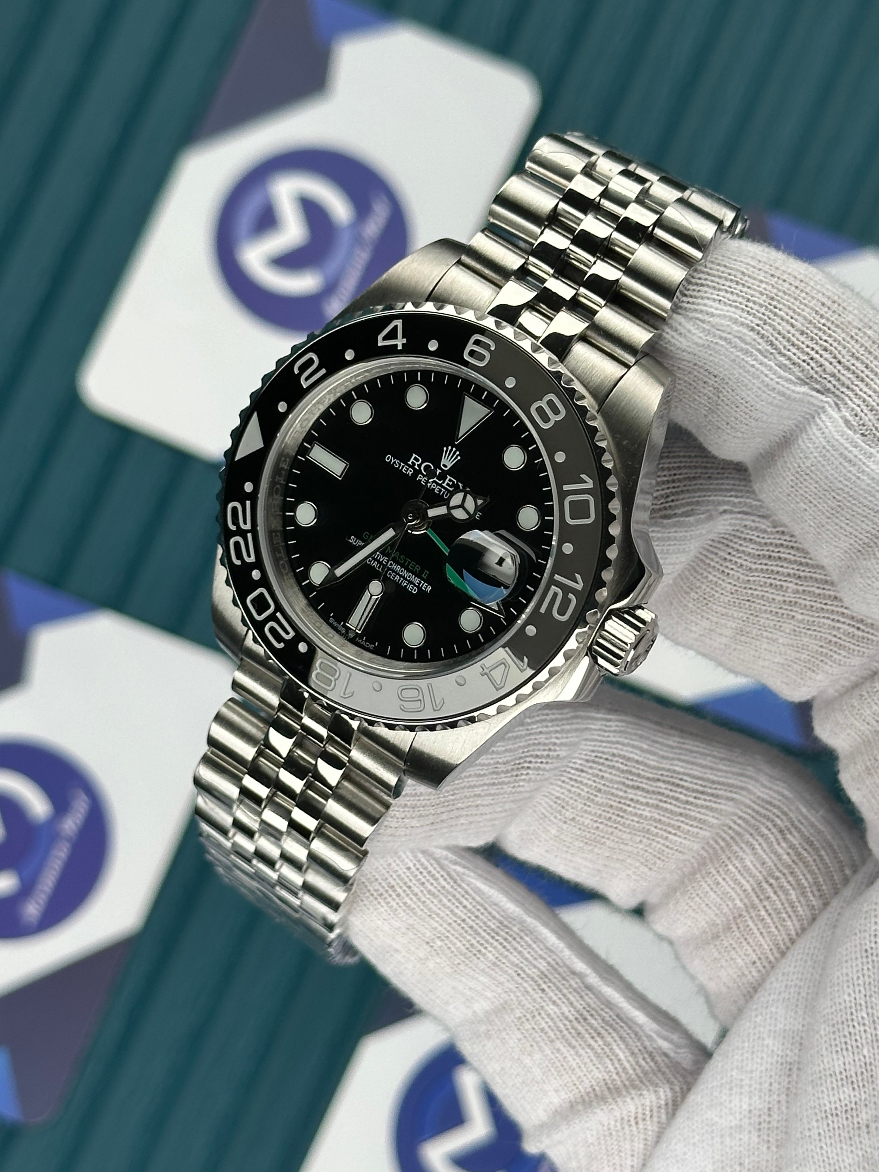 ROLEX GMT MASTER II BLACK DIAL GREY AND BLACK CERAMIC JUBILE