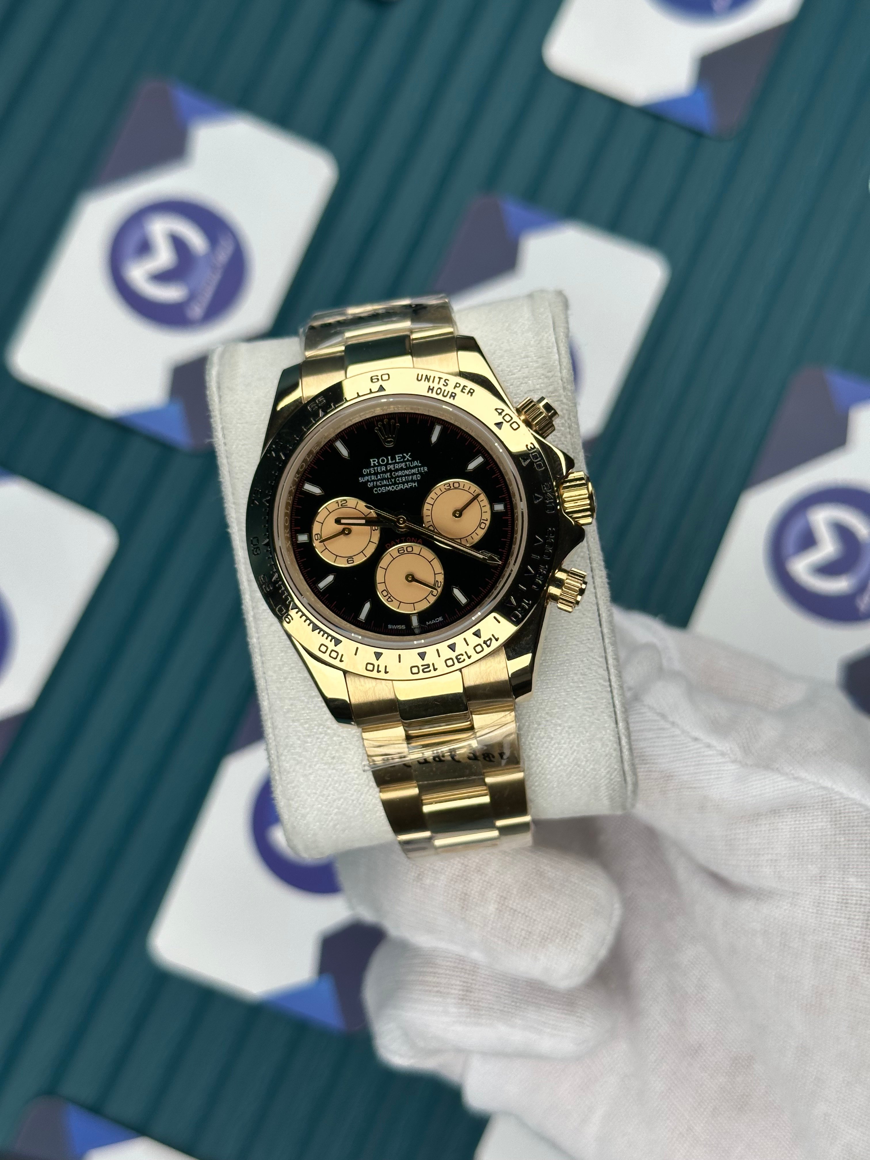 ROLEX DAYTONA BLACK DIAL GOLD OYSTER