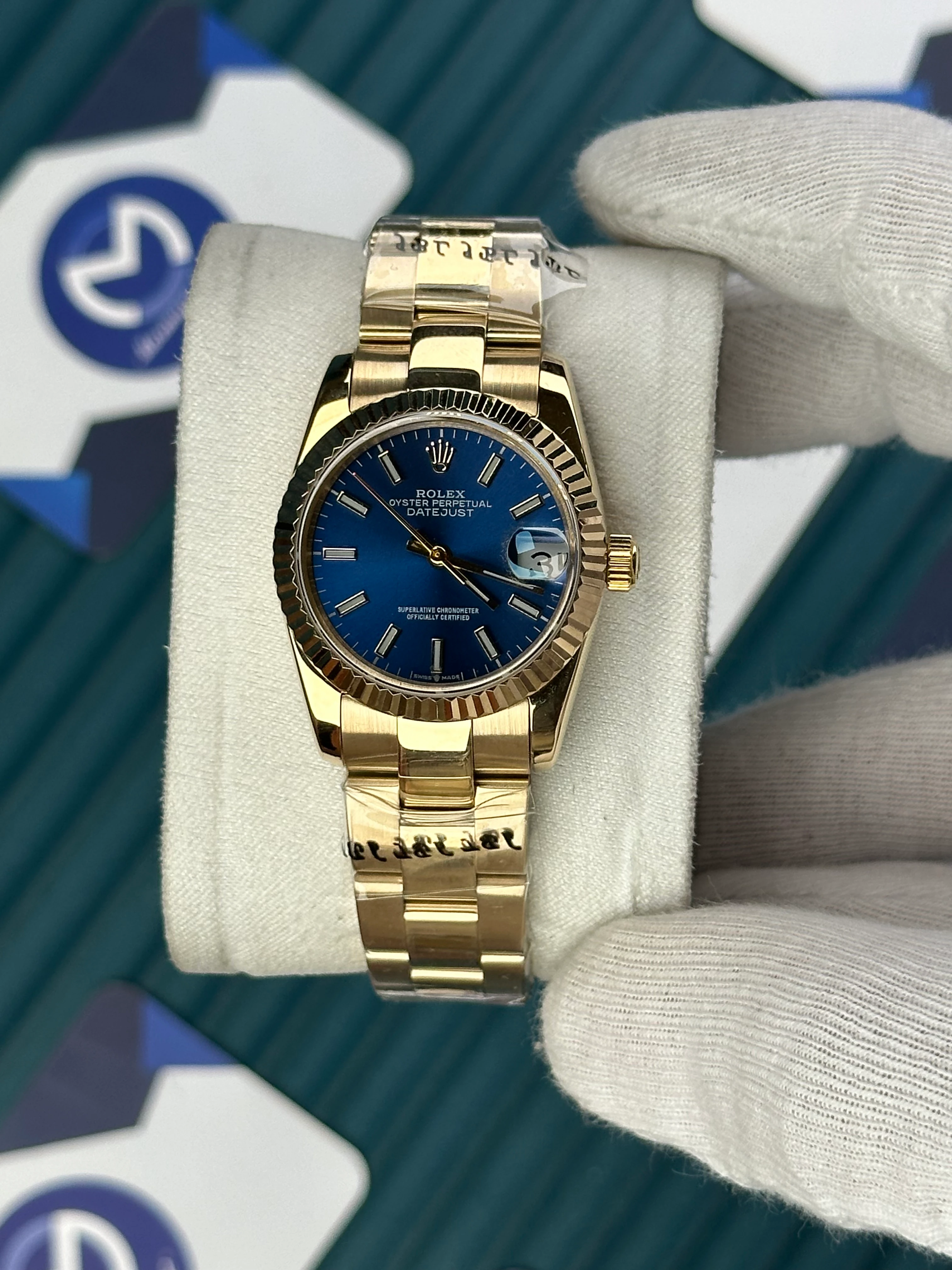 ROLEX 31 MM DATEJUST BLUE DIAL ROD INDEX GOLD OYSTER 