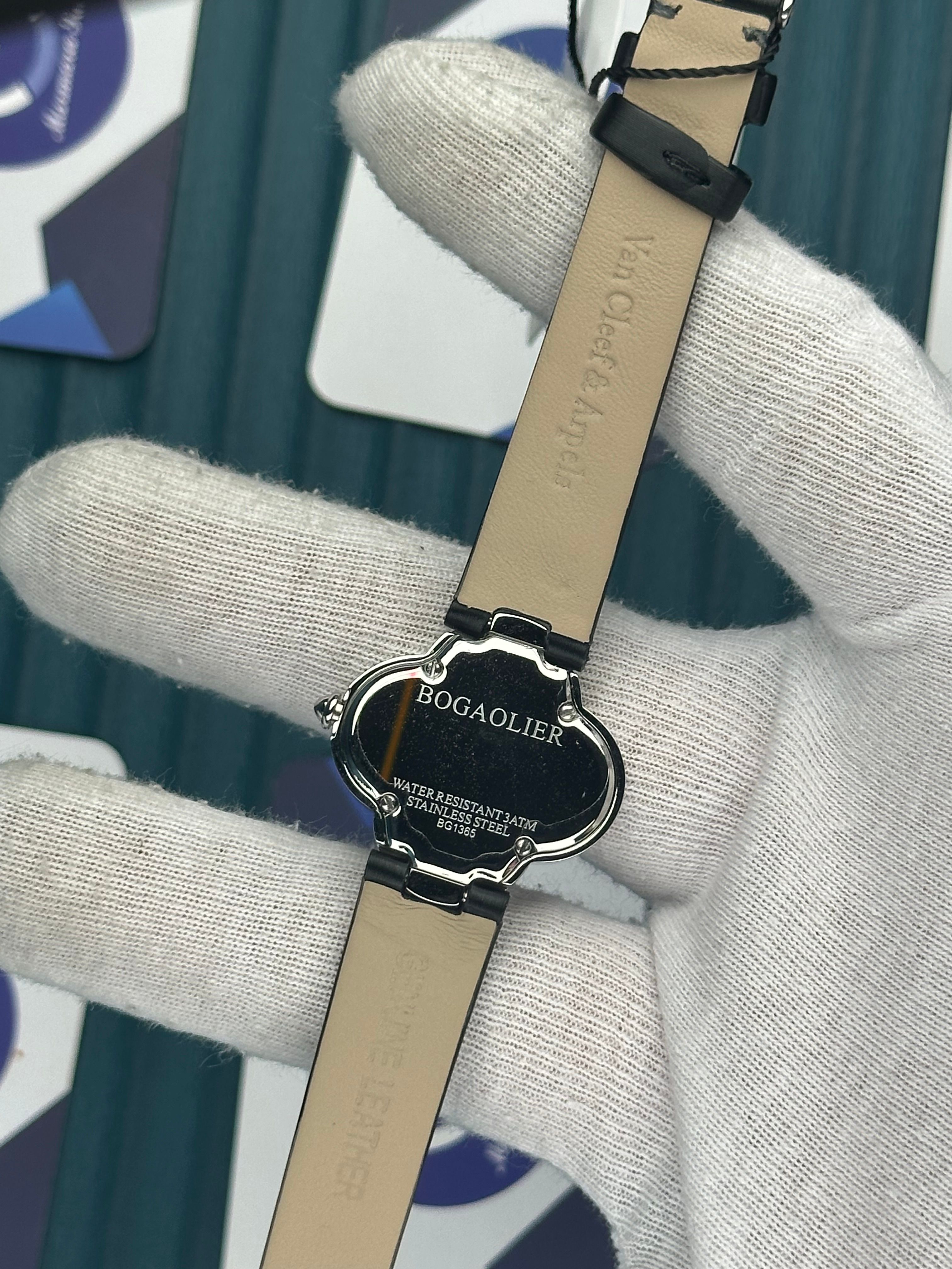 VAN CLEEF & ARPELS BLACK DIAL DIAMOND BEZEL SILVER CASE BLACK LEATHER CORD