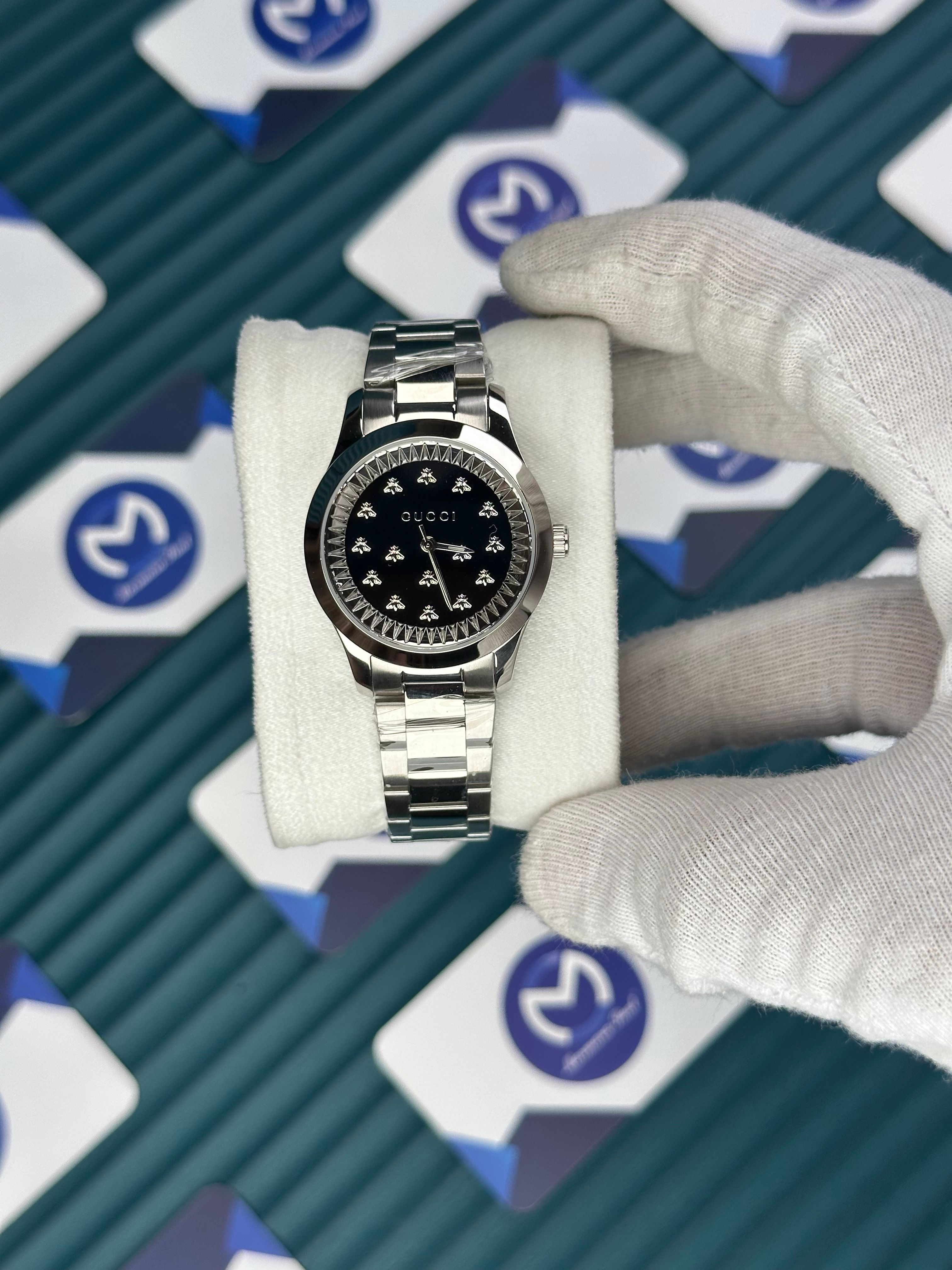 GUCCI WOMAN BLACK DIAL BUTTERFLY MOTIF SILVER