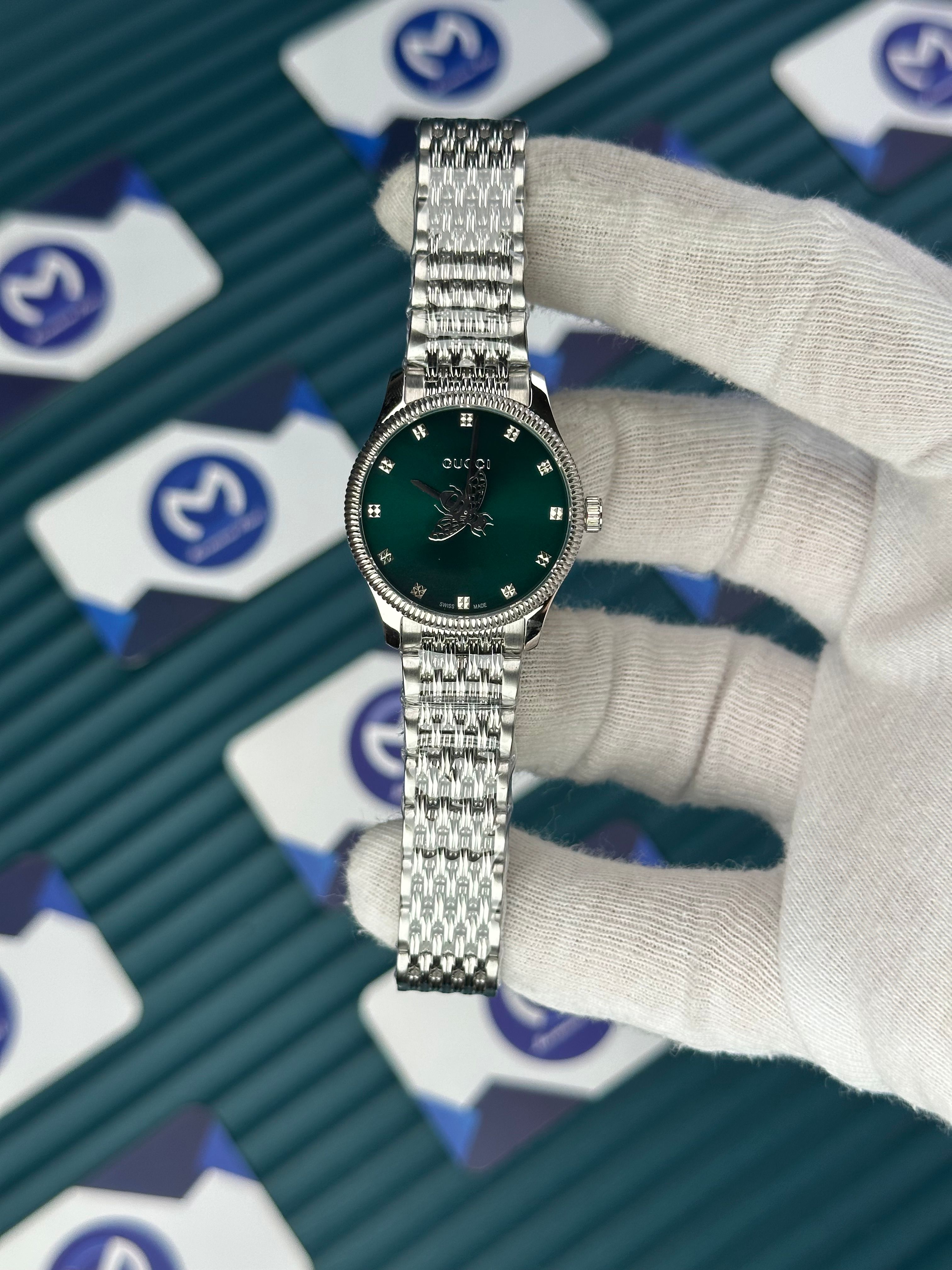GUCCI GREEN DIAL SPINNING BUTTERFLY SILVER