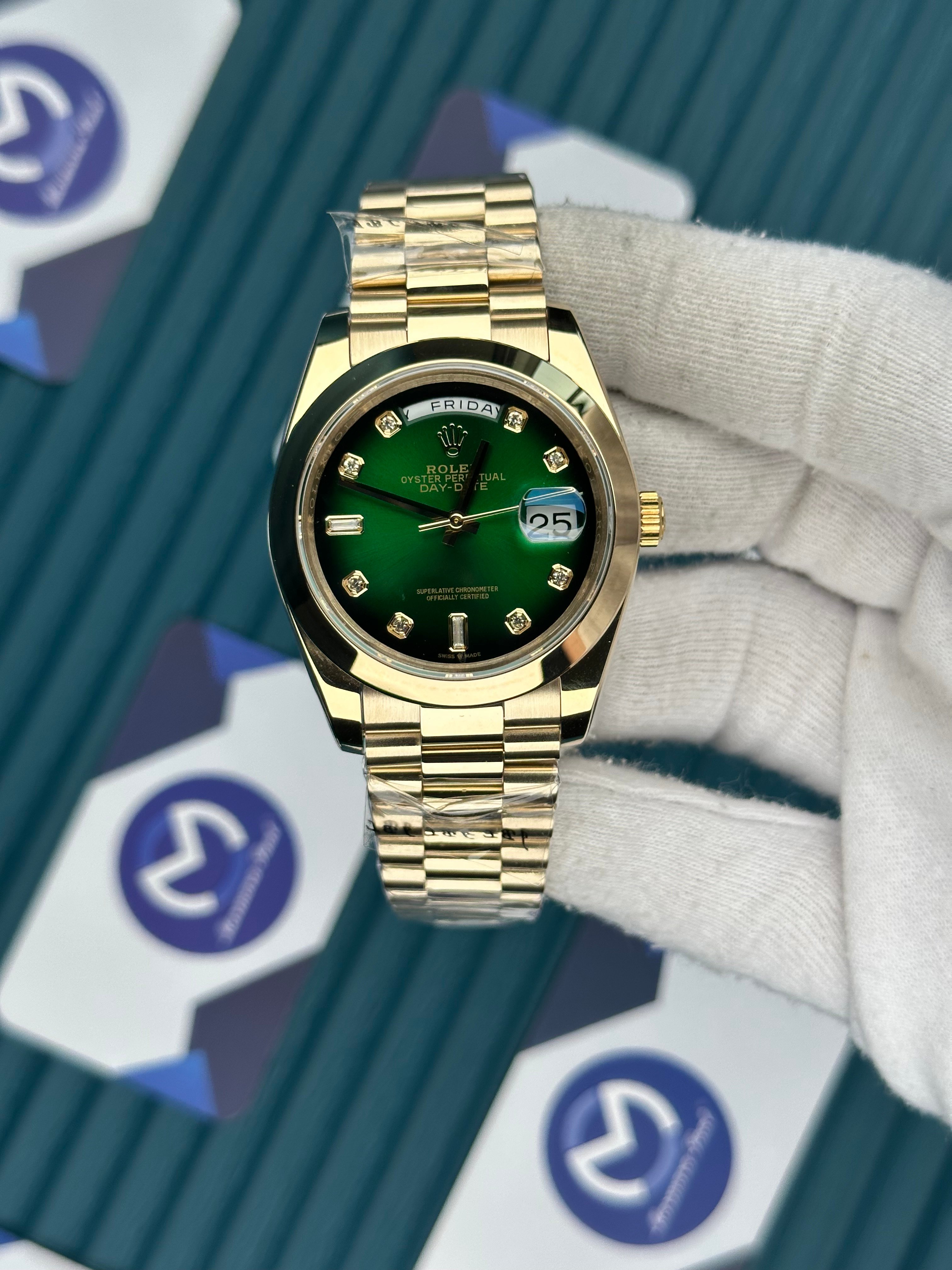 ROLEX DAY-DATE GREEN DIAL OVAL BEZEL DIAMOND INDEX GOLD PRESIDENT