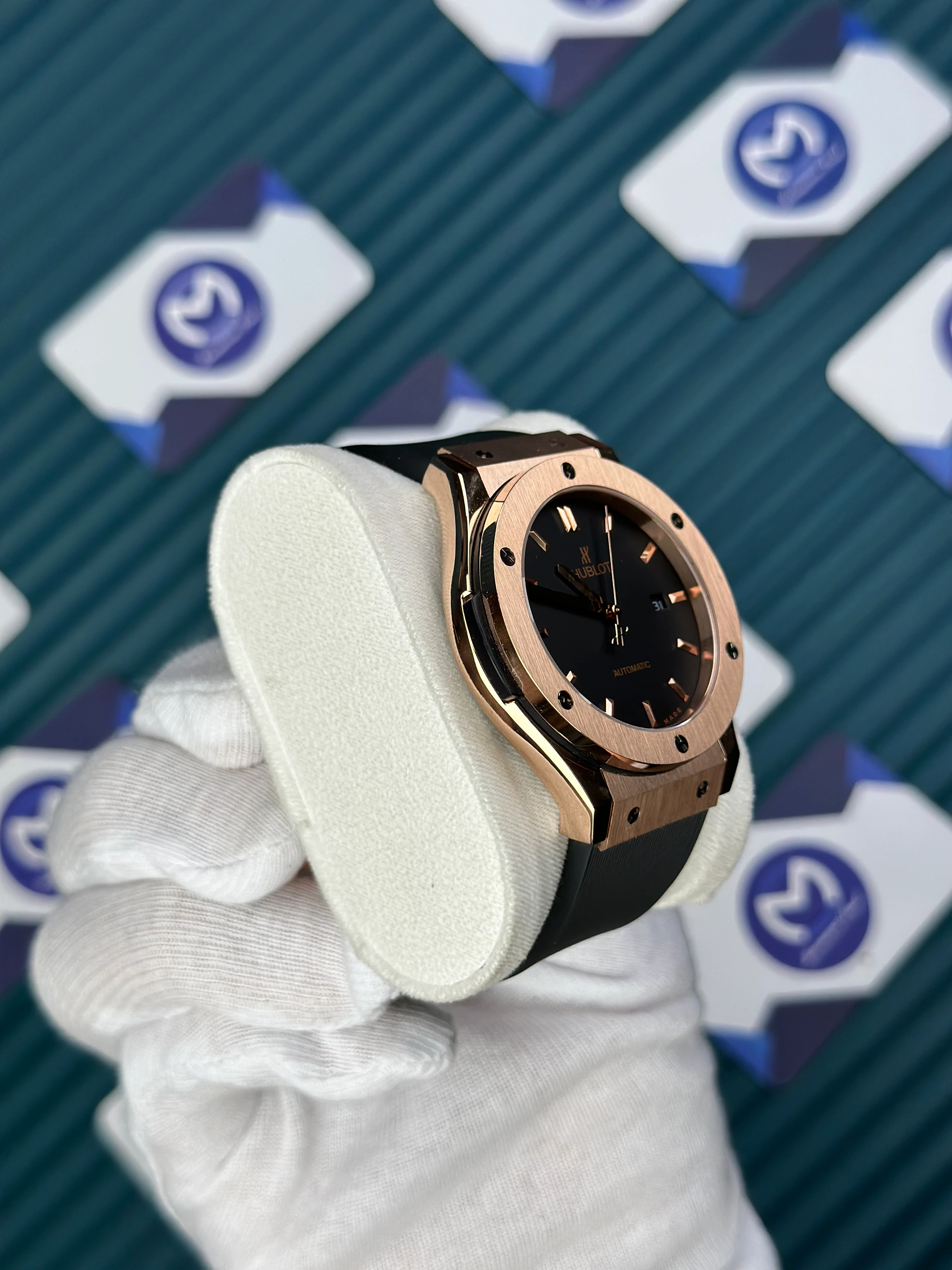 HUBLOT GENEVE AUTOMATIC VENDOME BLACK DIAL ROSE BEZEL BLACK CASE BLACK RUBBER CORD 