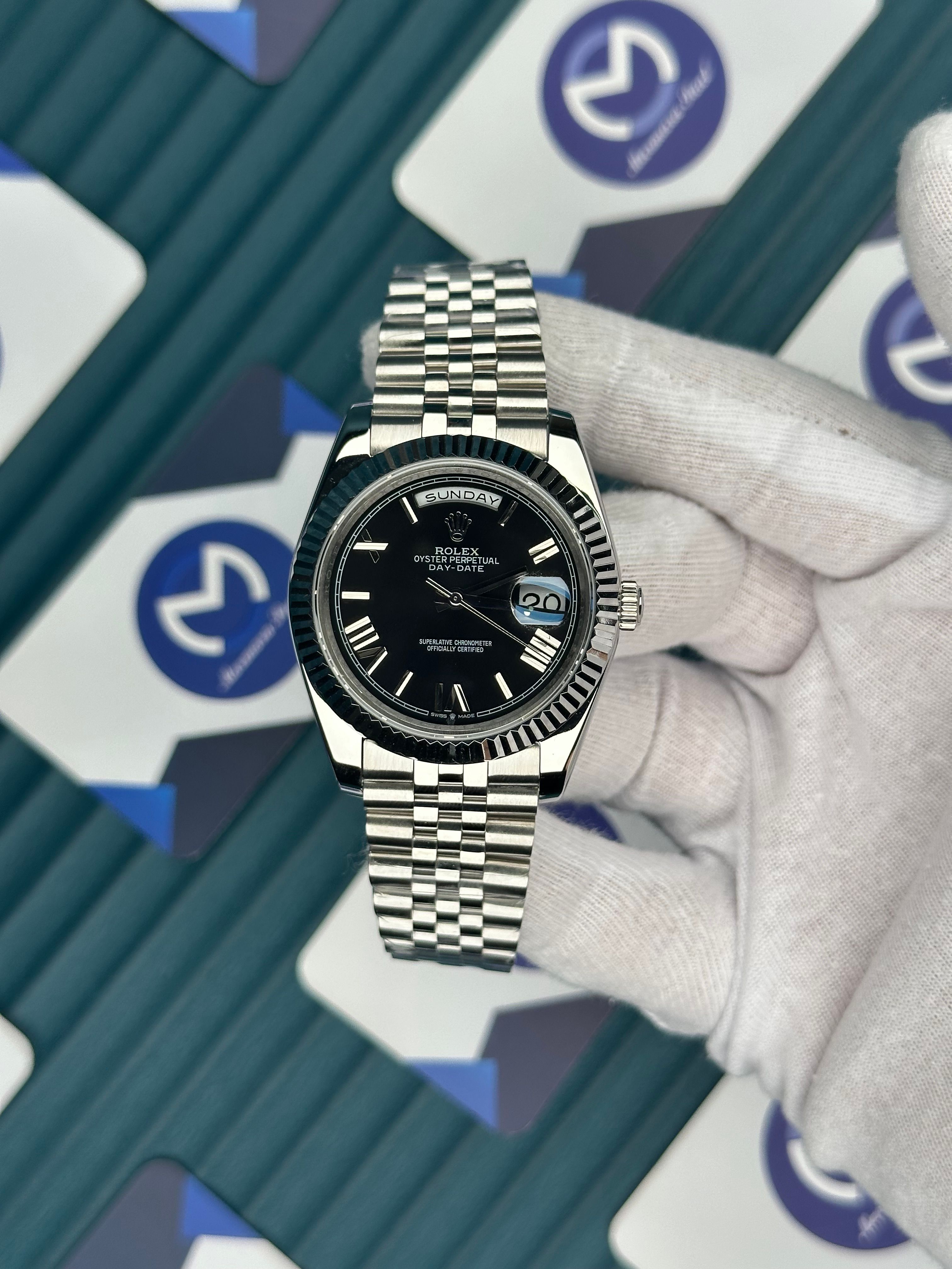 ROLEX DAY-DATE BLACK DIAL ROMA INDEX SILVER JUBILE