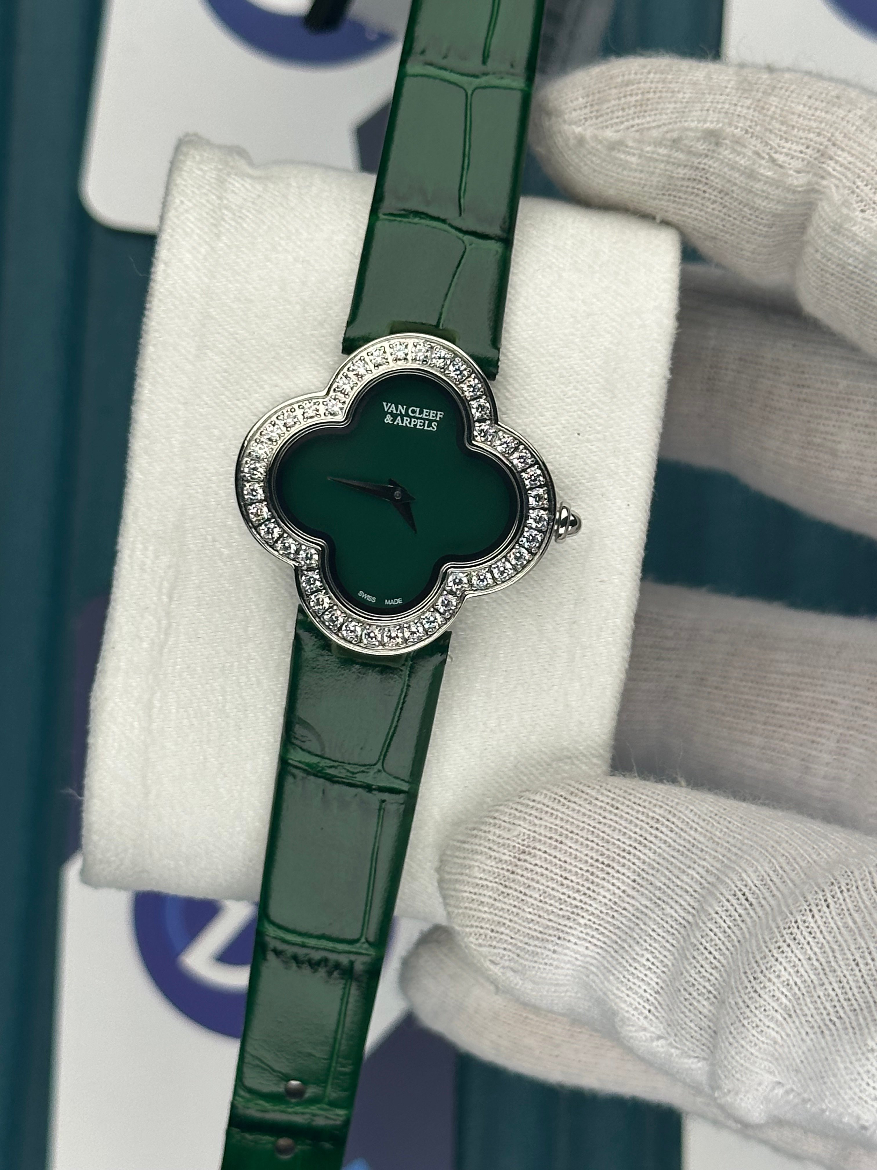 VAN CLEEF & ARPELS GREEN DIAL DIAMOND BEZEL SILVER CASE GREEN LEATHER CORD