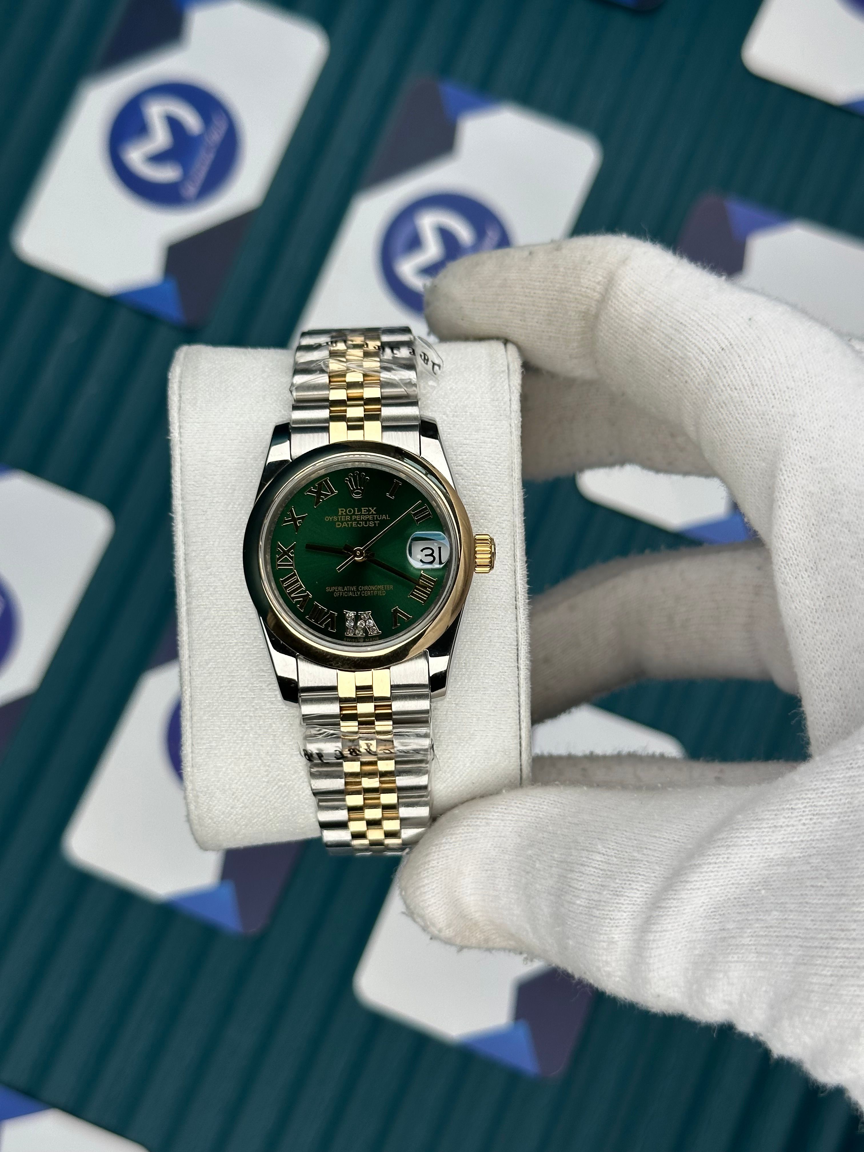 ROLEX 31 OVAL BEZEL GREEN DIAL GOLD-SILVER JUBILEE