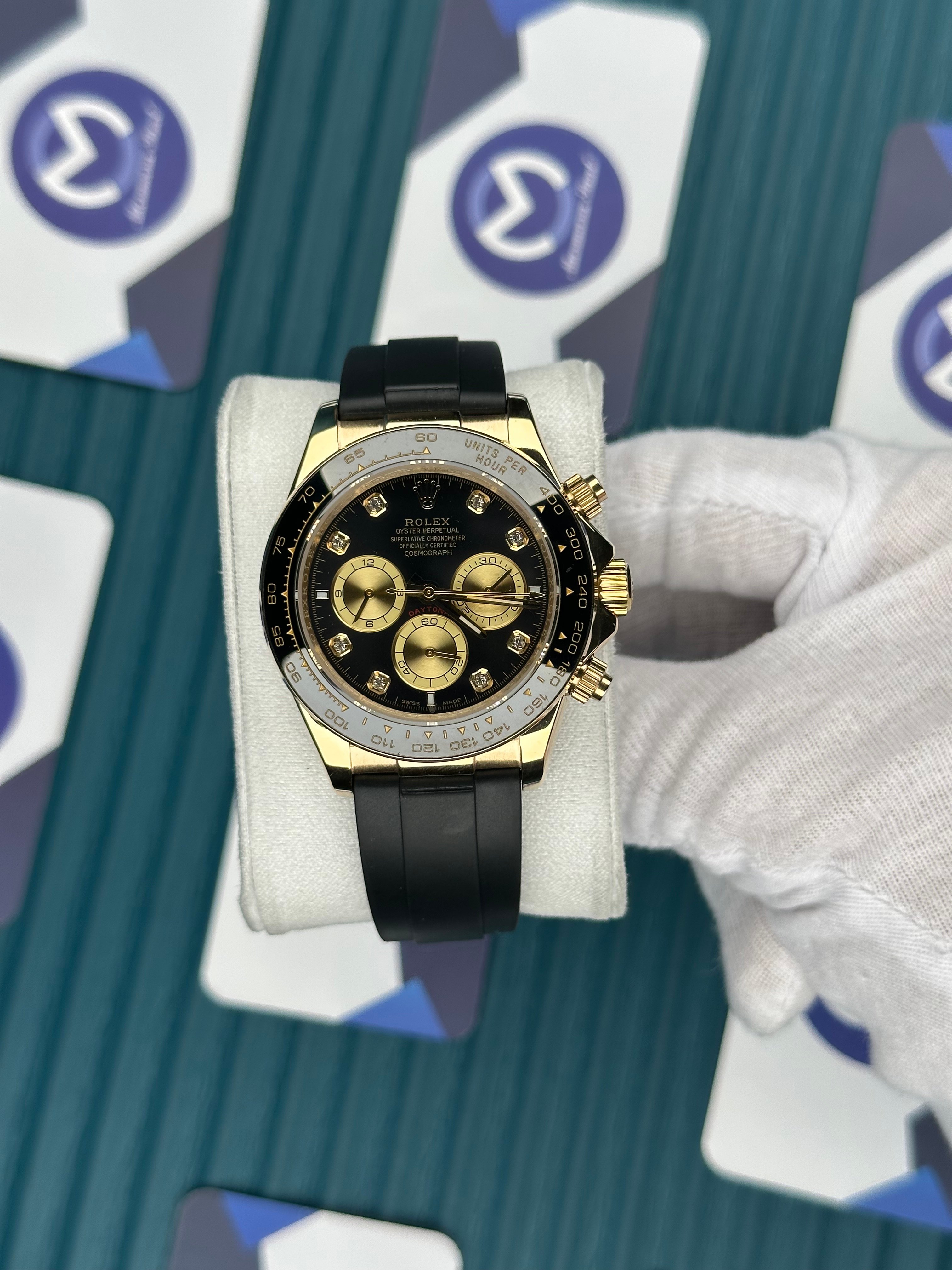 ROLEX DAYTONA BLACK DIAL DIAMOND INDEX GOLD CASE OYSTERFLEX