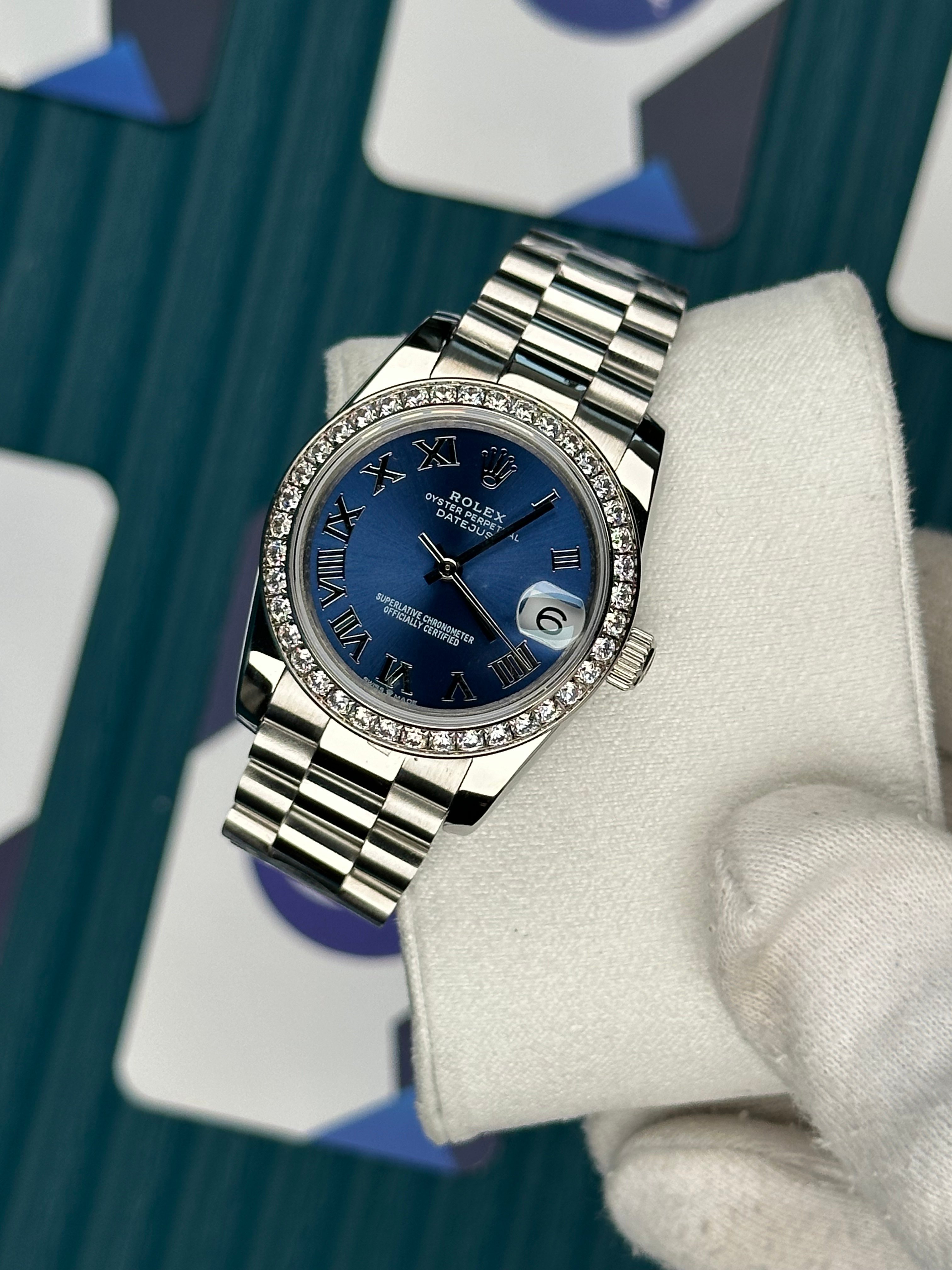 ROLEX 31 BLUE DIAL DIAMOND BEZEL SILVER PRESIDENT