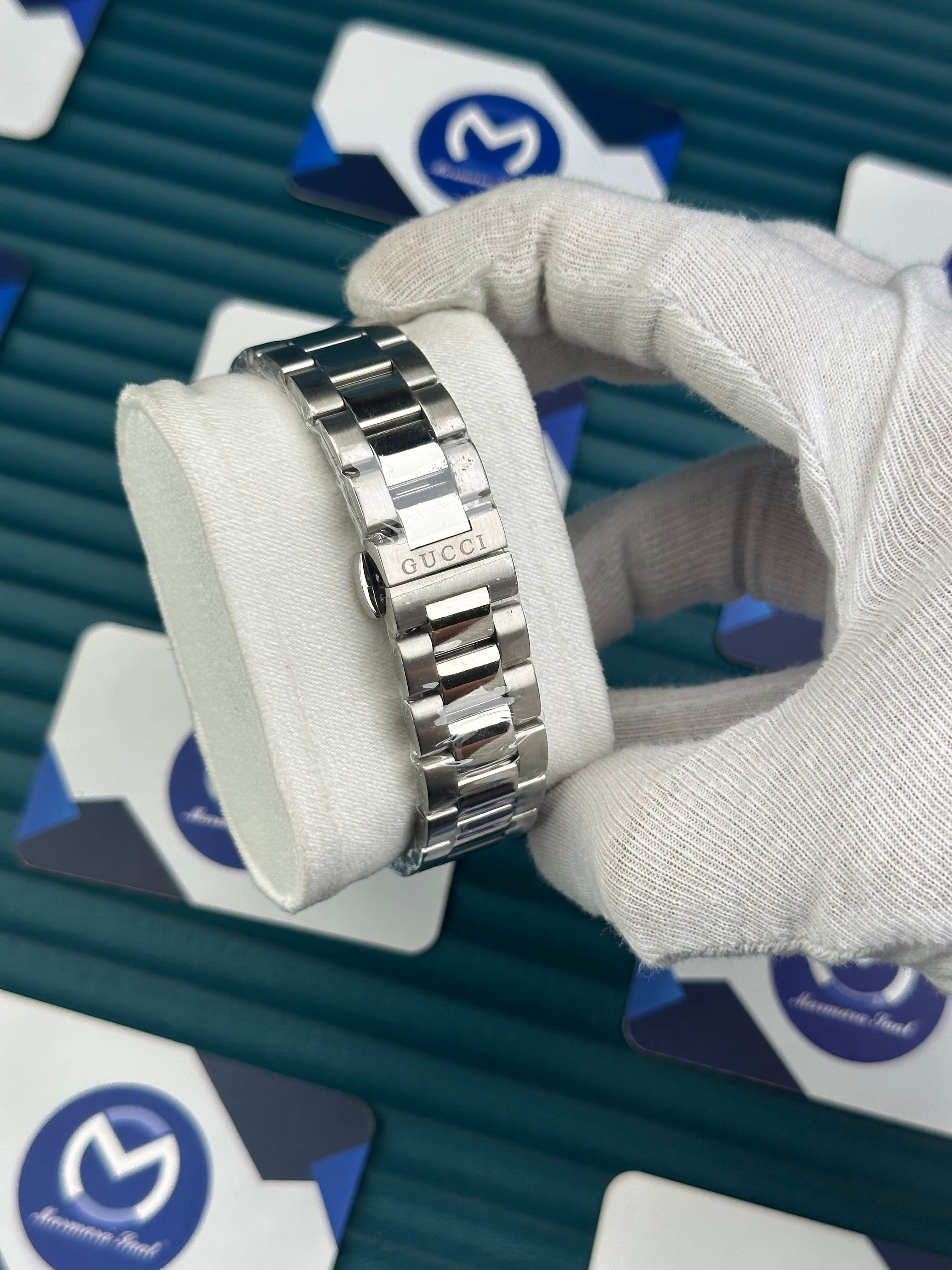 GUCCI BLACK DIAL TRIANGLE INDEX SILVER CORD