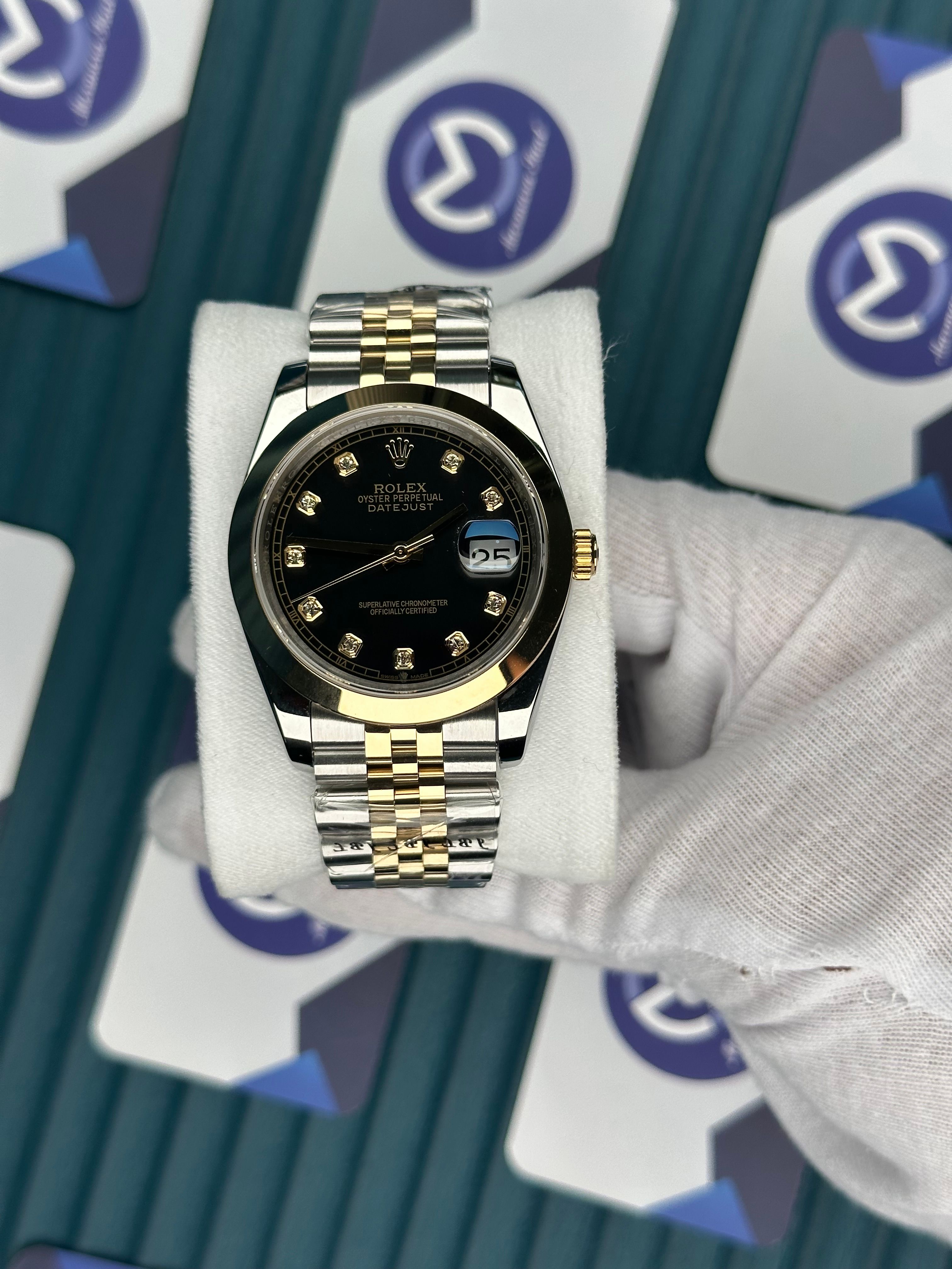 ROLEX DATEJUST OVAL BEZEL BLACK DIAL DIAMOND INDEX GOLD-JUBILE
