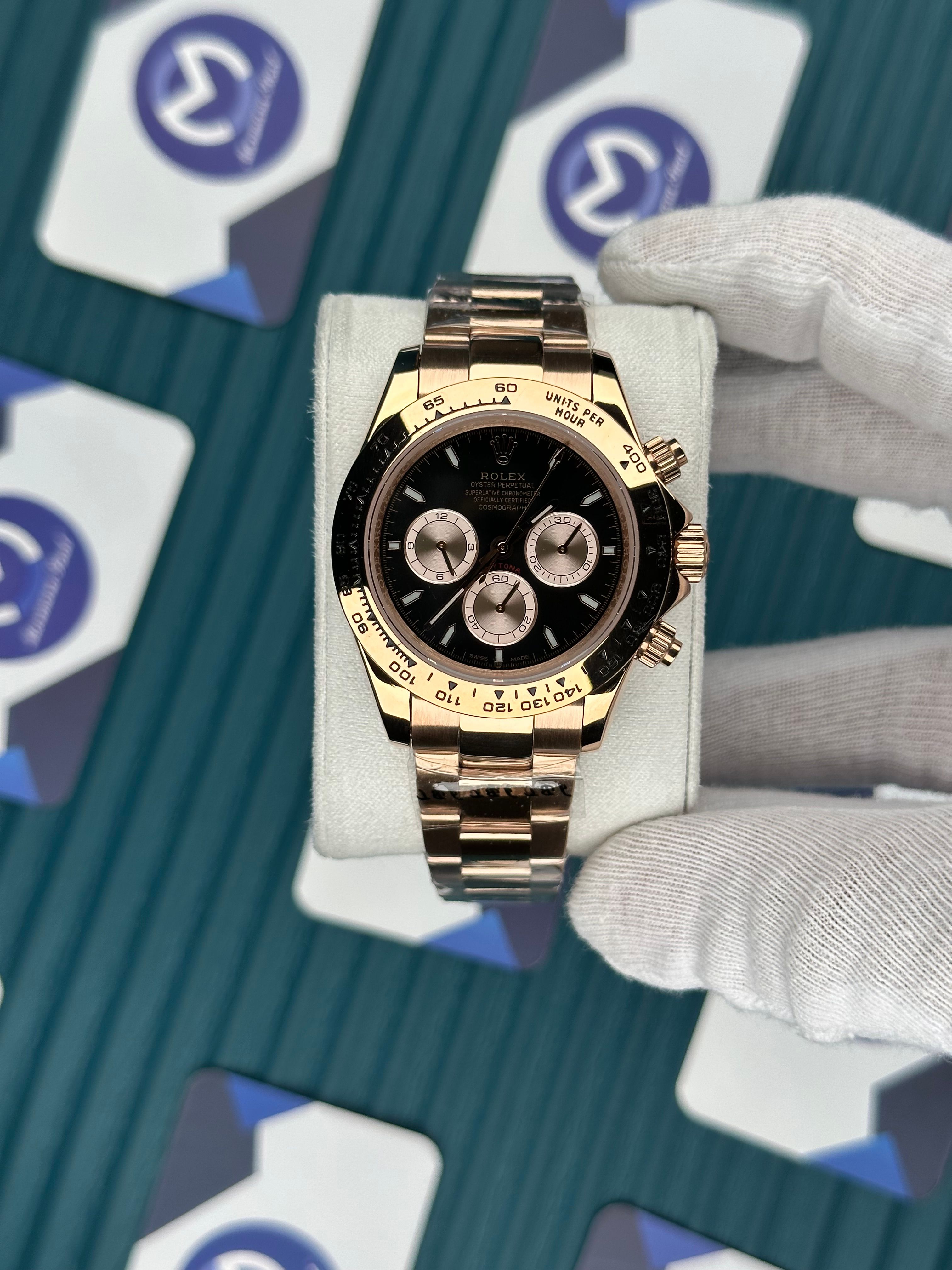 ROLEX DAYTONA BLACK DIAL ROSE OYSTER