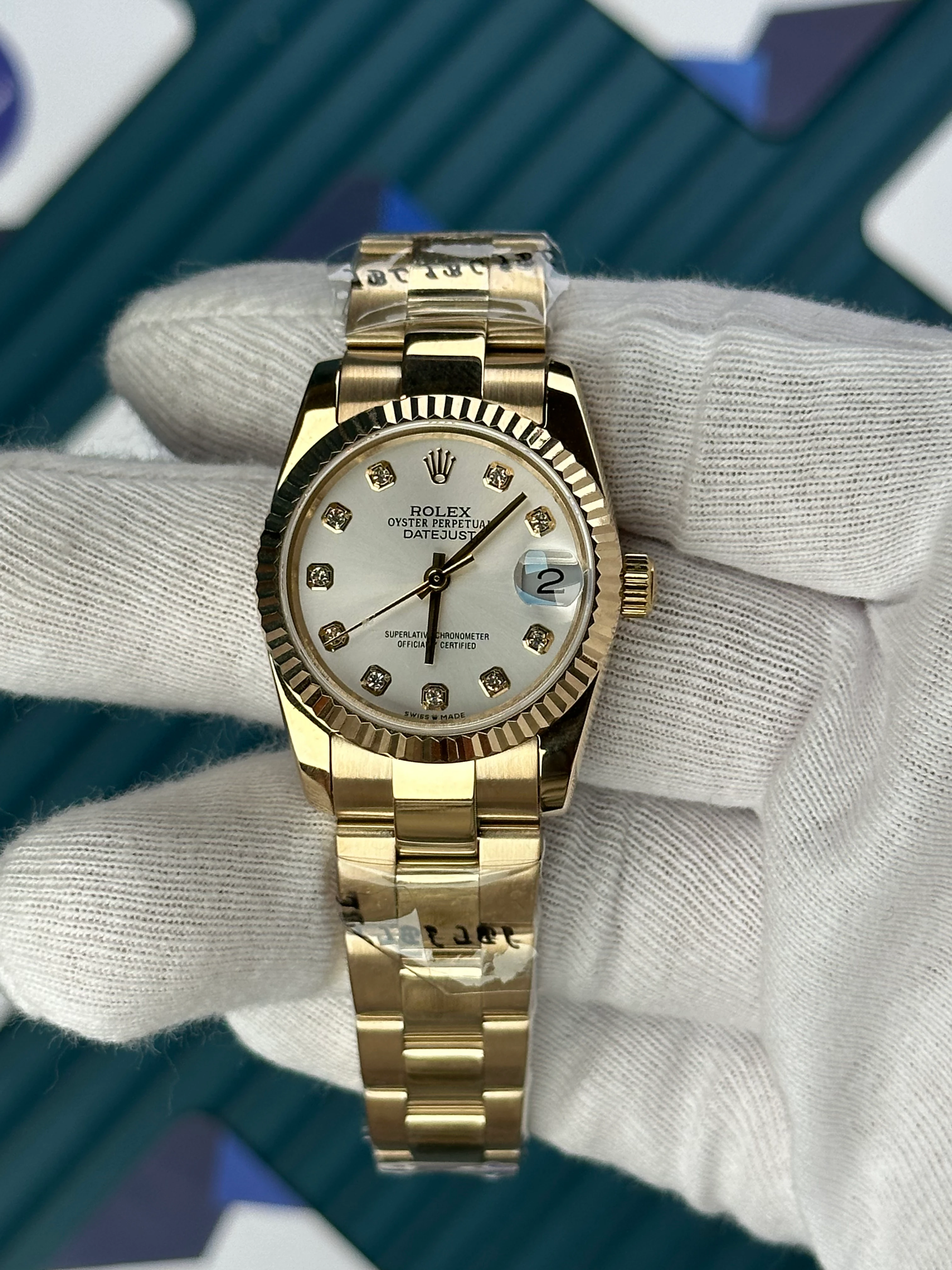 ROLEX 31 MM DATEJUST WHITE DIAL DIAMOND INDEX GOLD OYSTER 