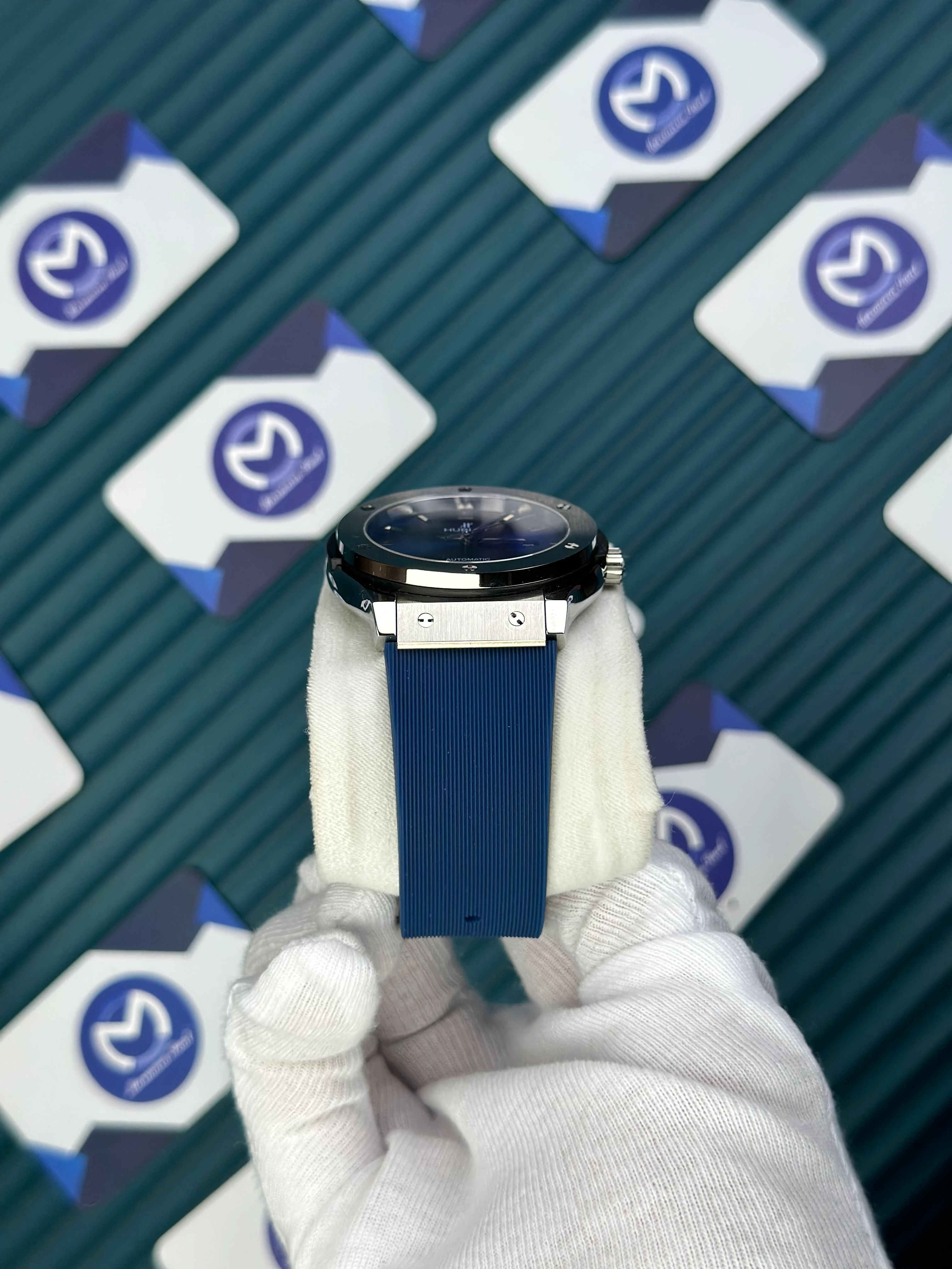 HUBLOT GENEVE AUTOMATIC BLUE DIAL SILVER CASE BLUE RUBBER CORD 