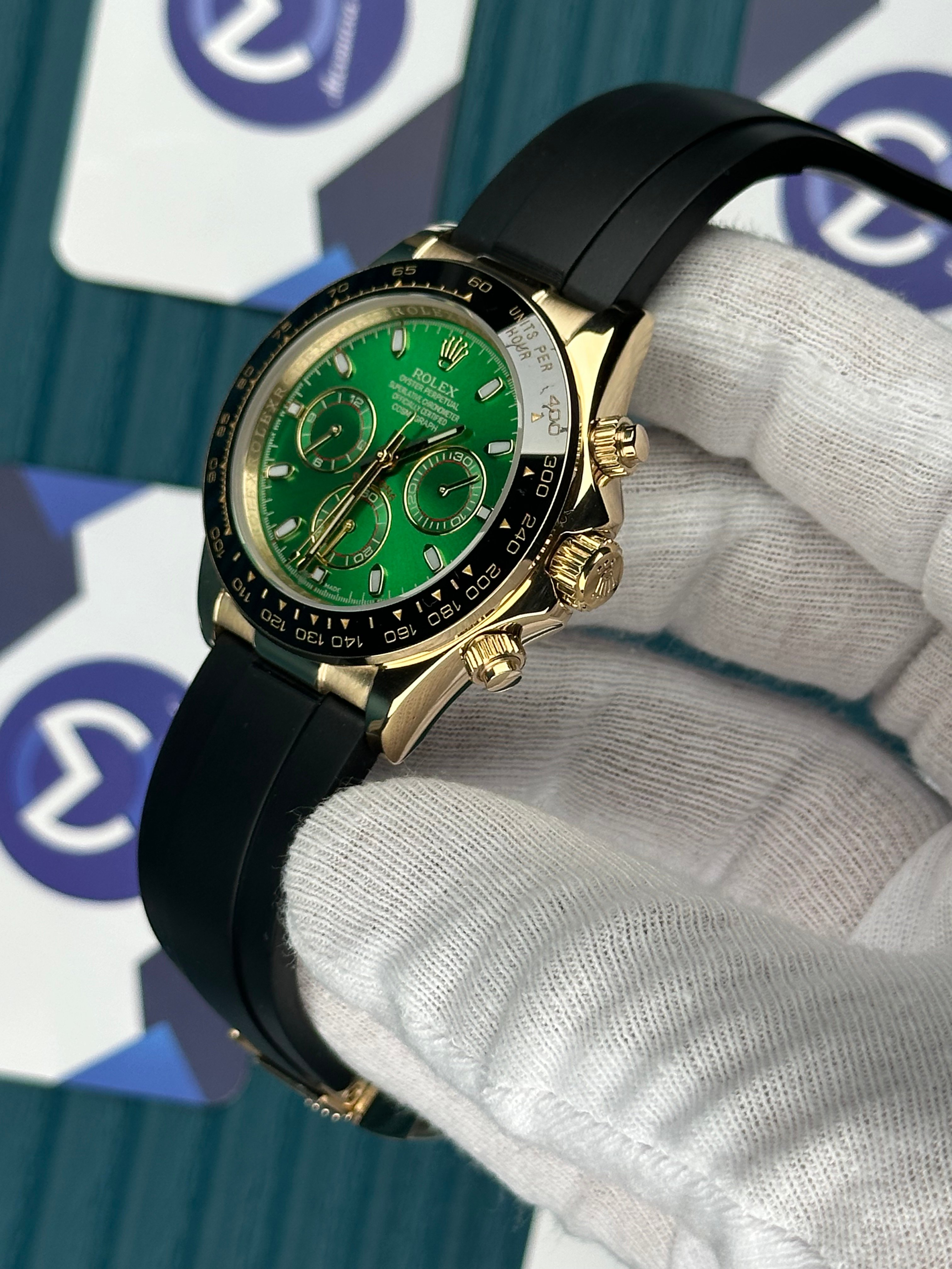 ROLEX DAYTONA GREEN DIAL GOLD CASE OYSTERFLEX