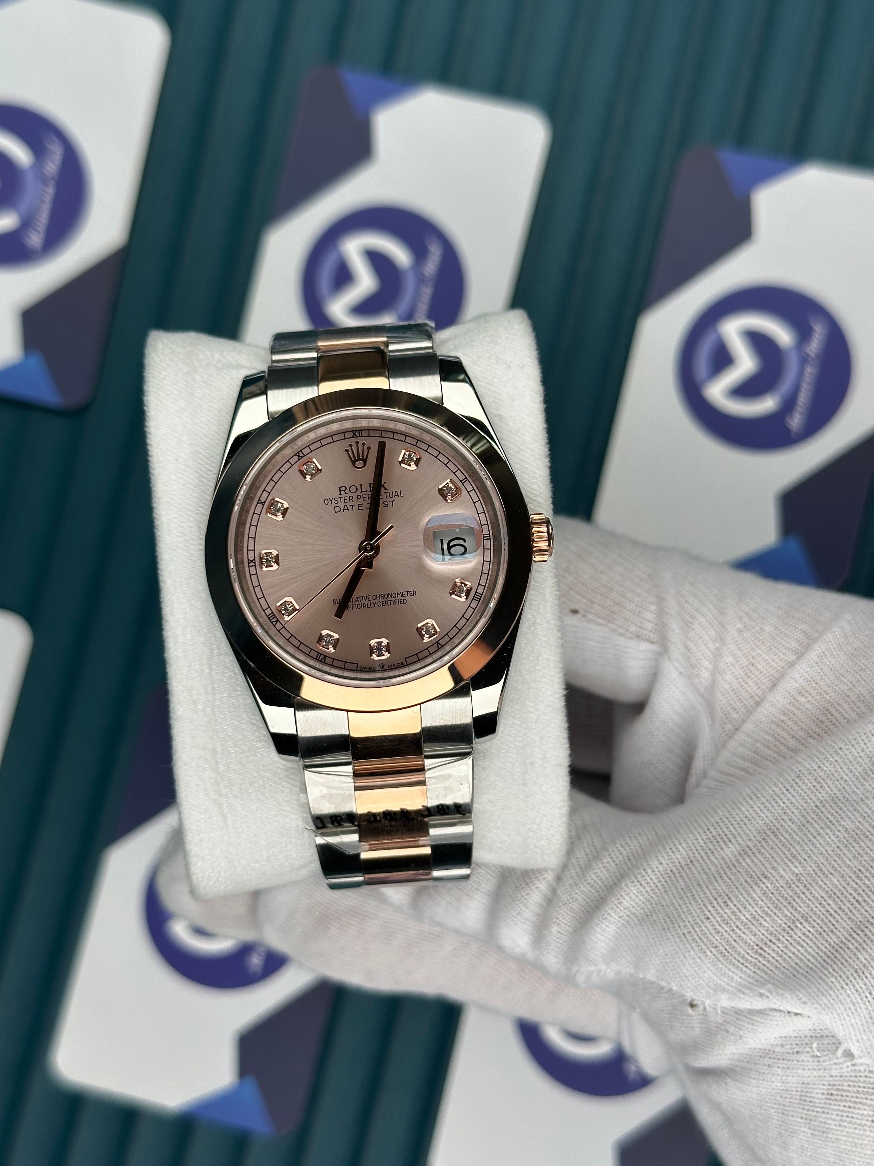 ROLEX DATEJUST CHAMPAGNE DIAL OVAL BEZEL ROSE-SILVER OYSTER