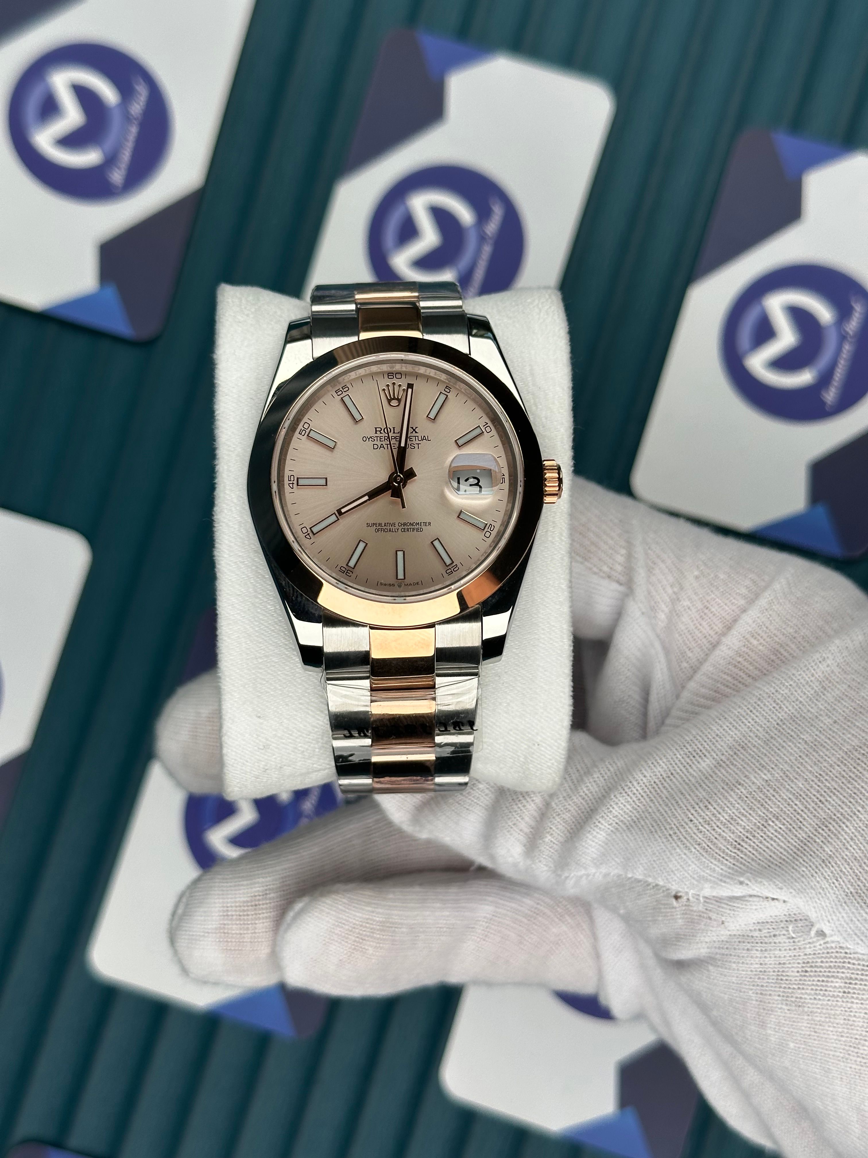 ROLEX DATEJUST OVAL BEZEL CHAMPAGNE DIAL ROSE-SILVER OYSTER