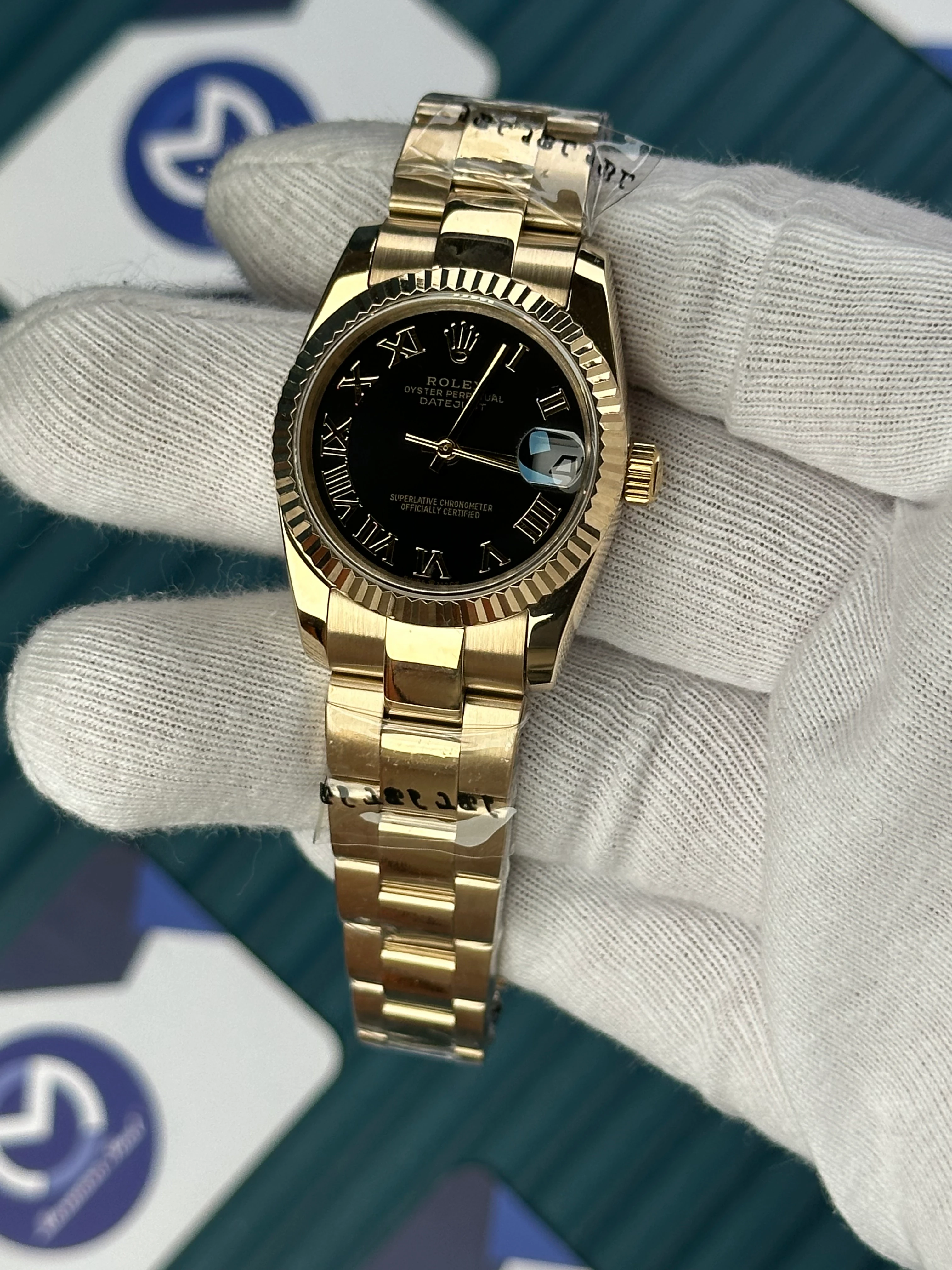 ROLEX 31 MM DATEJUST BLACK DIAL ROMA INDEX GOLD OYSTER 