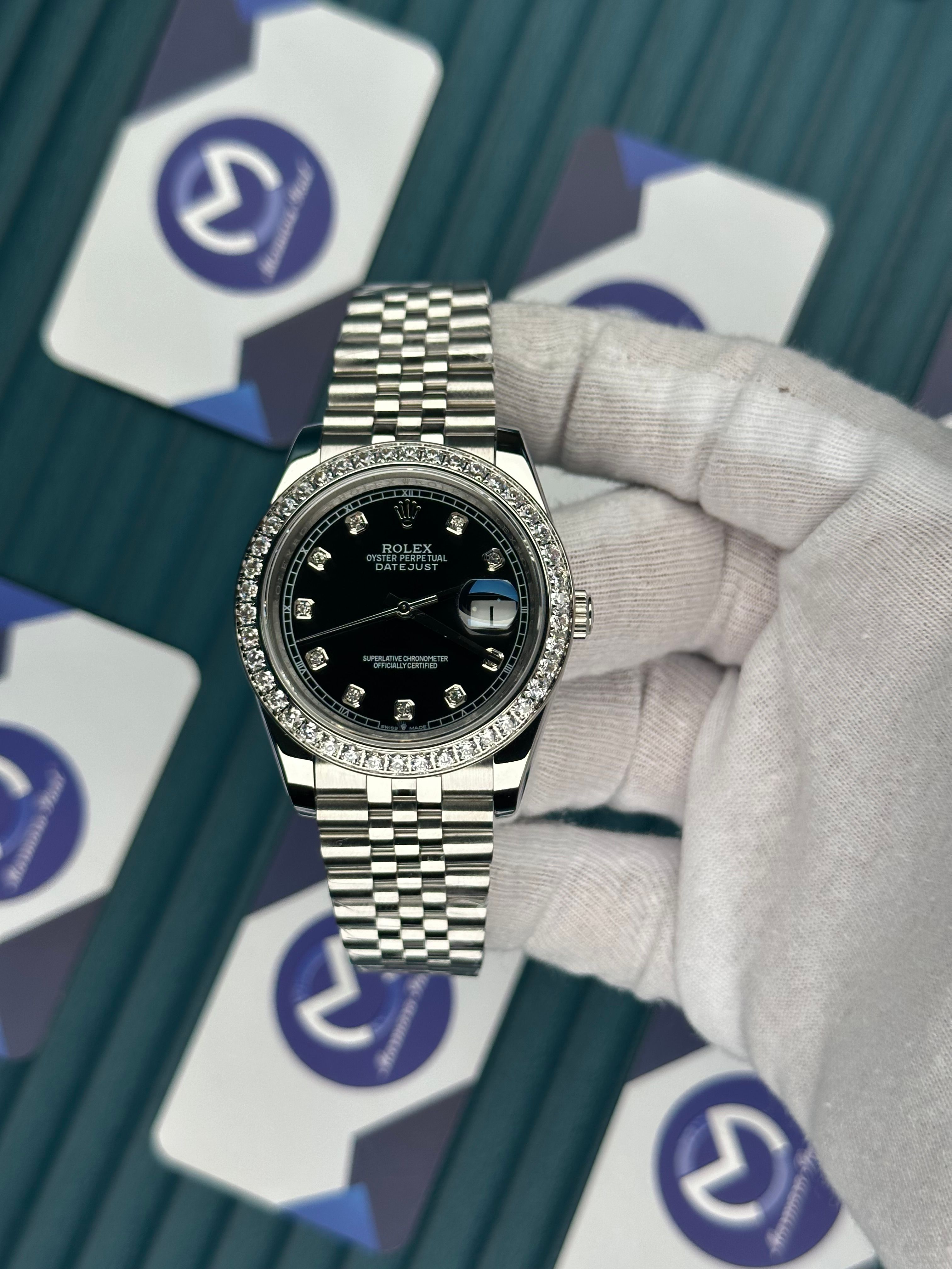 ROLEX DATEJUST BLACK DIAL DIAMOND INDEX AND BEZEL SILVER JUBILE