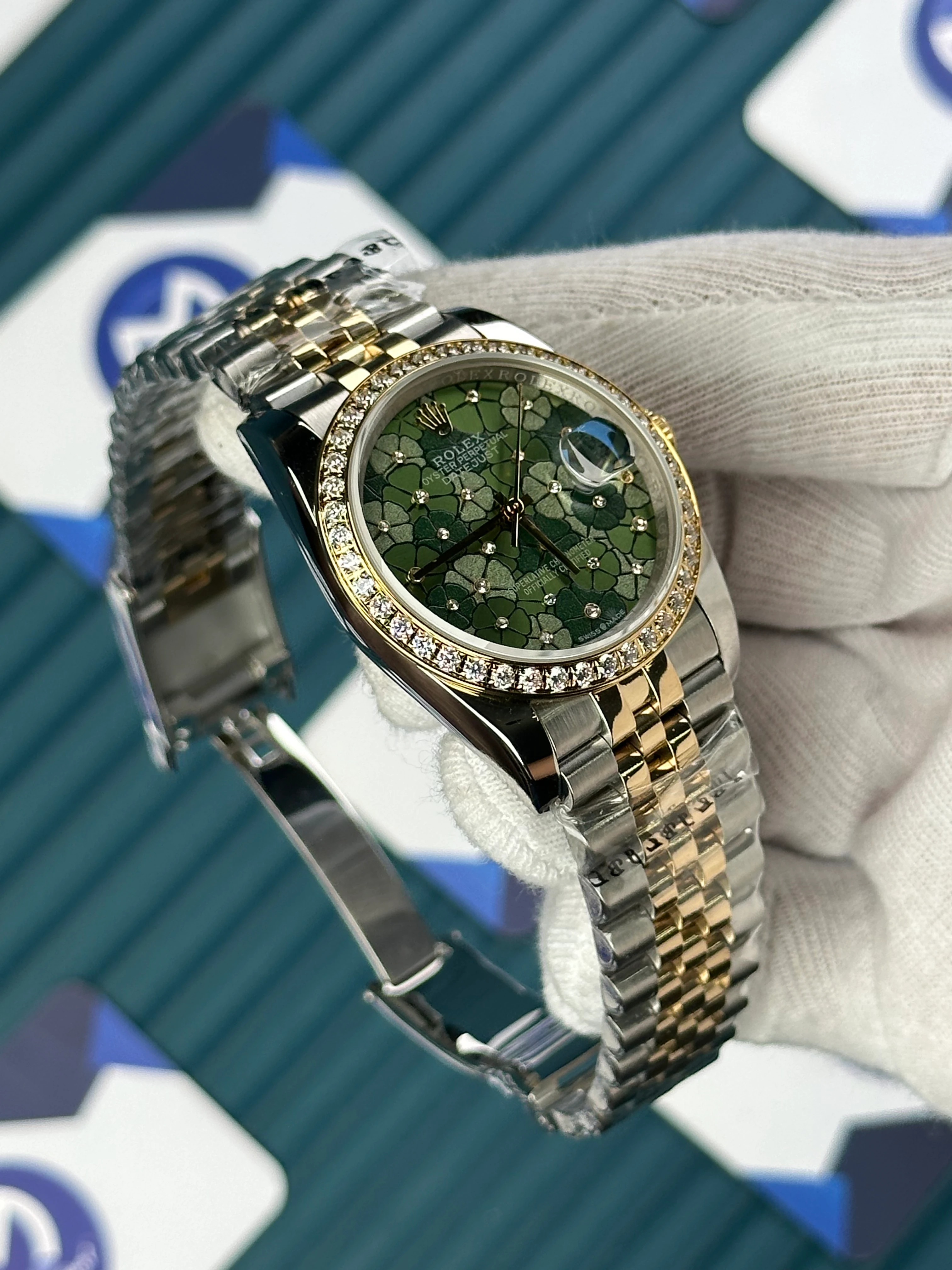 ROLEX 36 MM DATEJUST GREEN LEAF DIAL DIAMOND BEZEL GOLD-SILVER JUBILE 