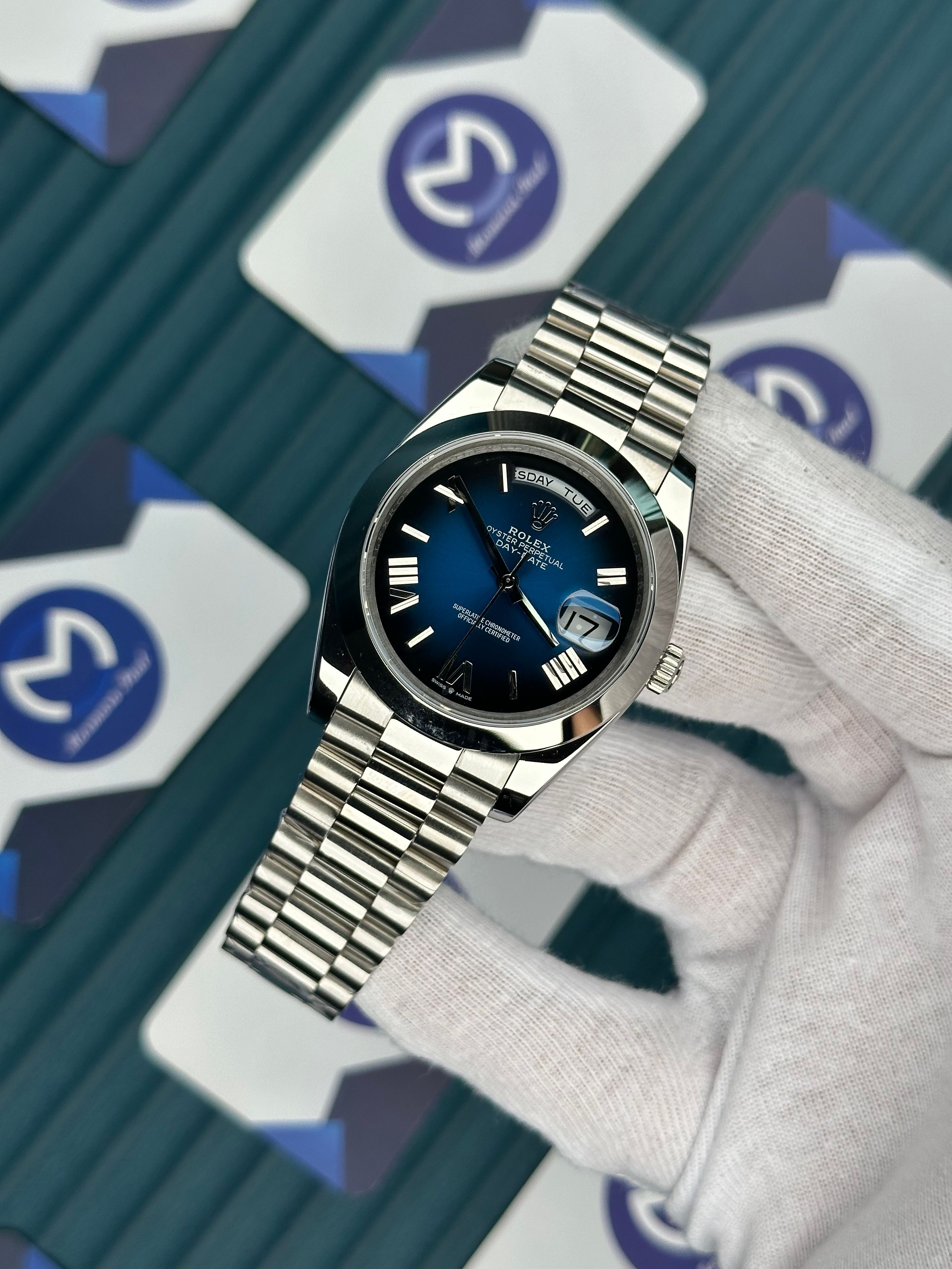 ROLEX DAY-DATE BLUE OCEAN DIAL OVAL BEZEL SILVER PRESIDENT