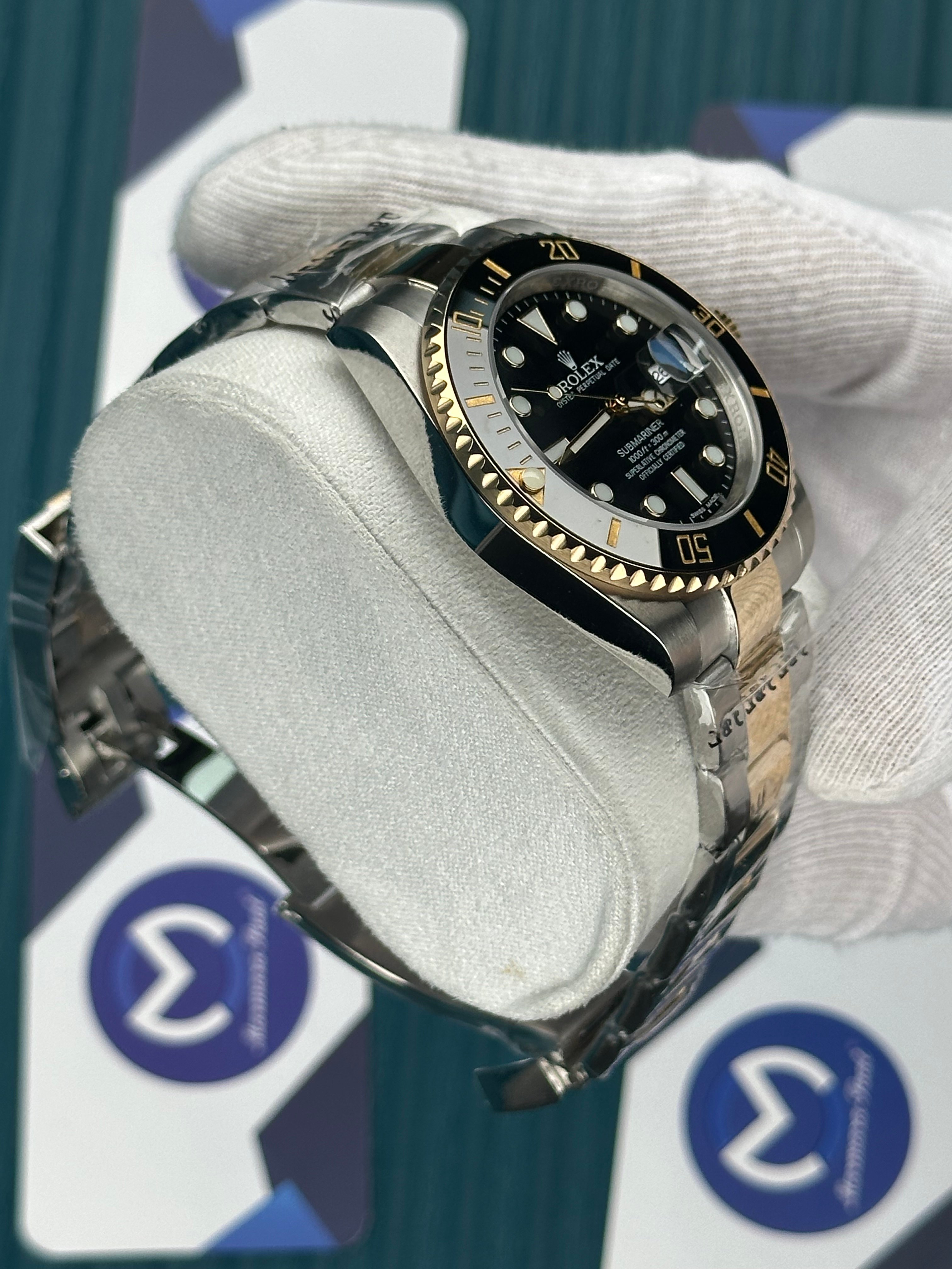 ROLEX SUBMARINER BLACK DIAL GOLD-SILVER OYSTER