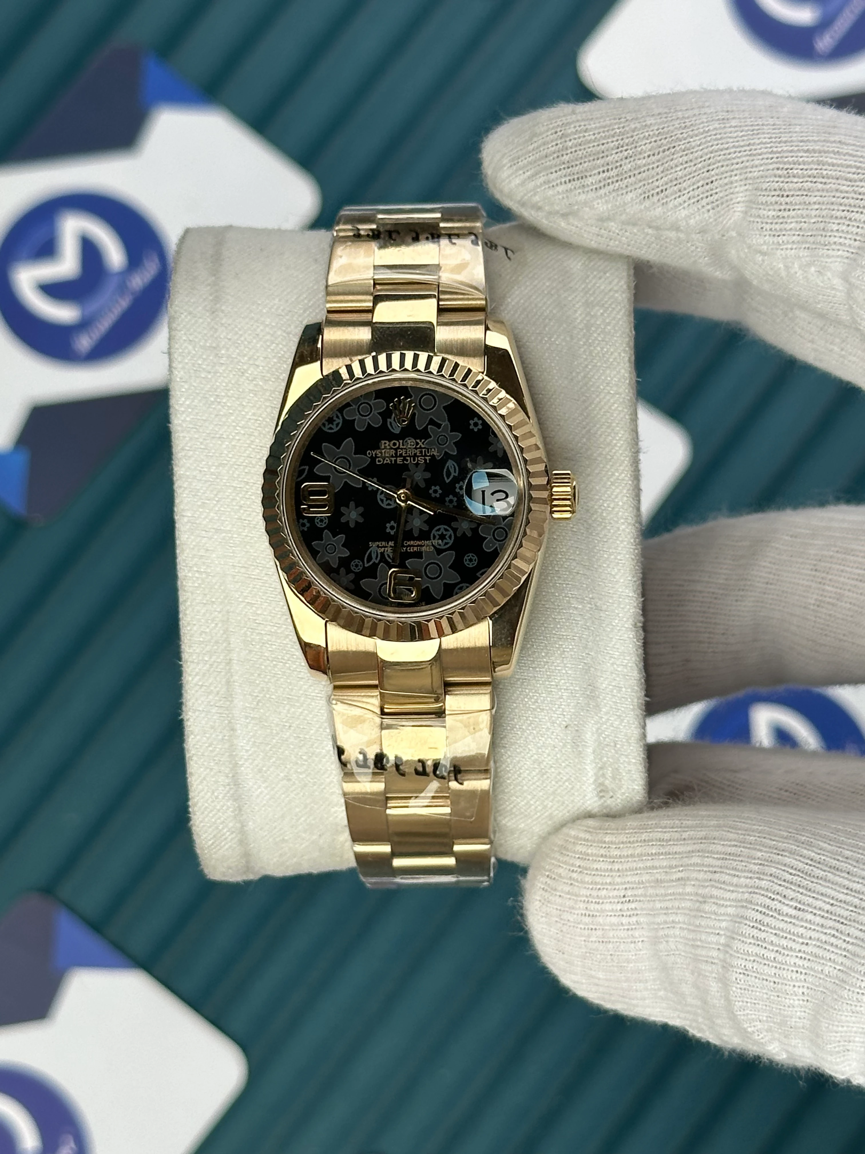 ROLEX 31 MM DATEJUST BLACK FLOWERS PATTERNED DIAL GOLD OYSTER 