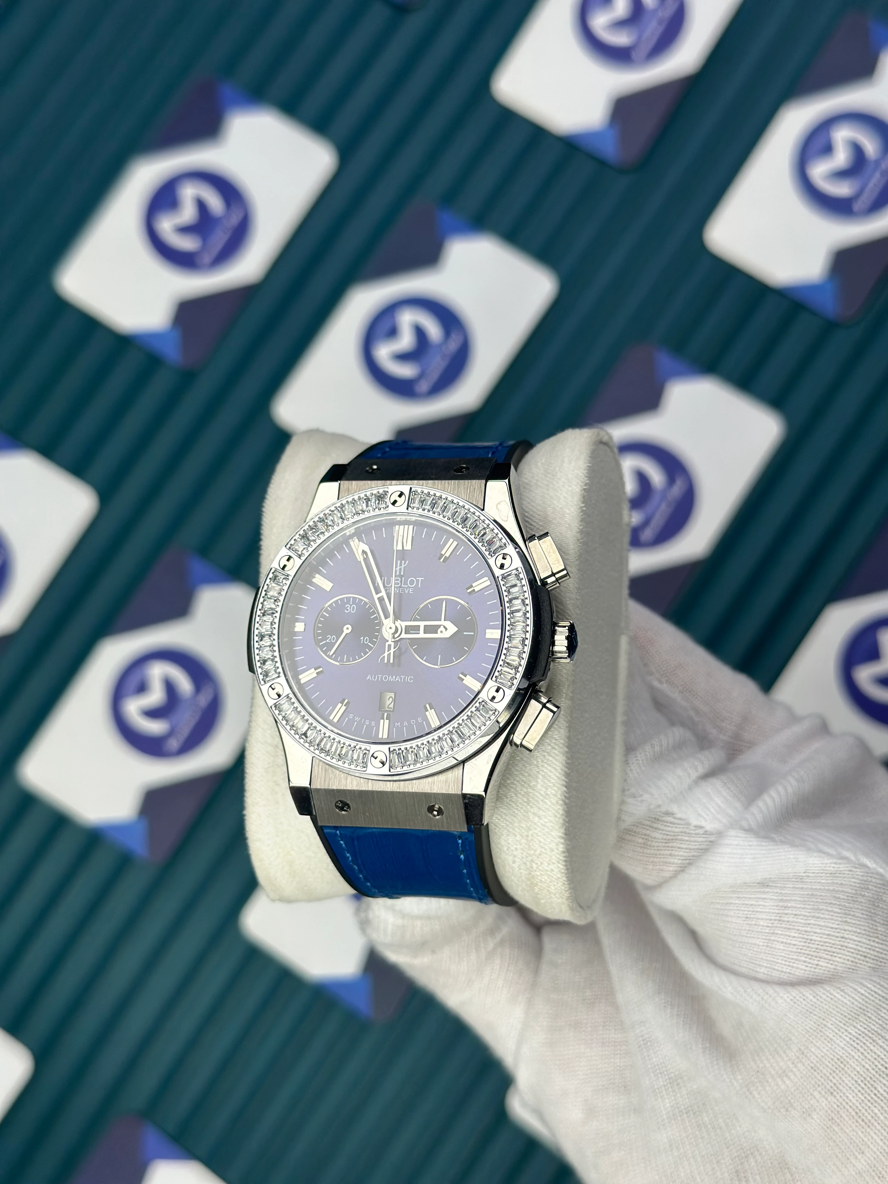 HUBLOT AUTOMATIC BLUE CHRONOGRAPH DIAL DIAMOND BEZEL SILVER CASE BLUE LEATHER CORD 