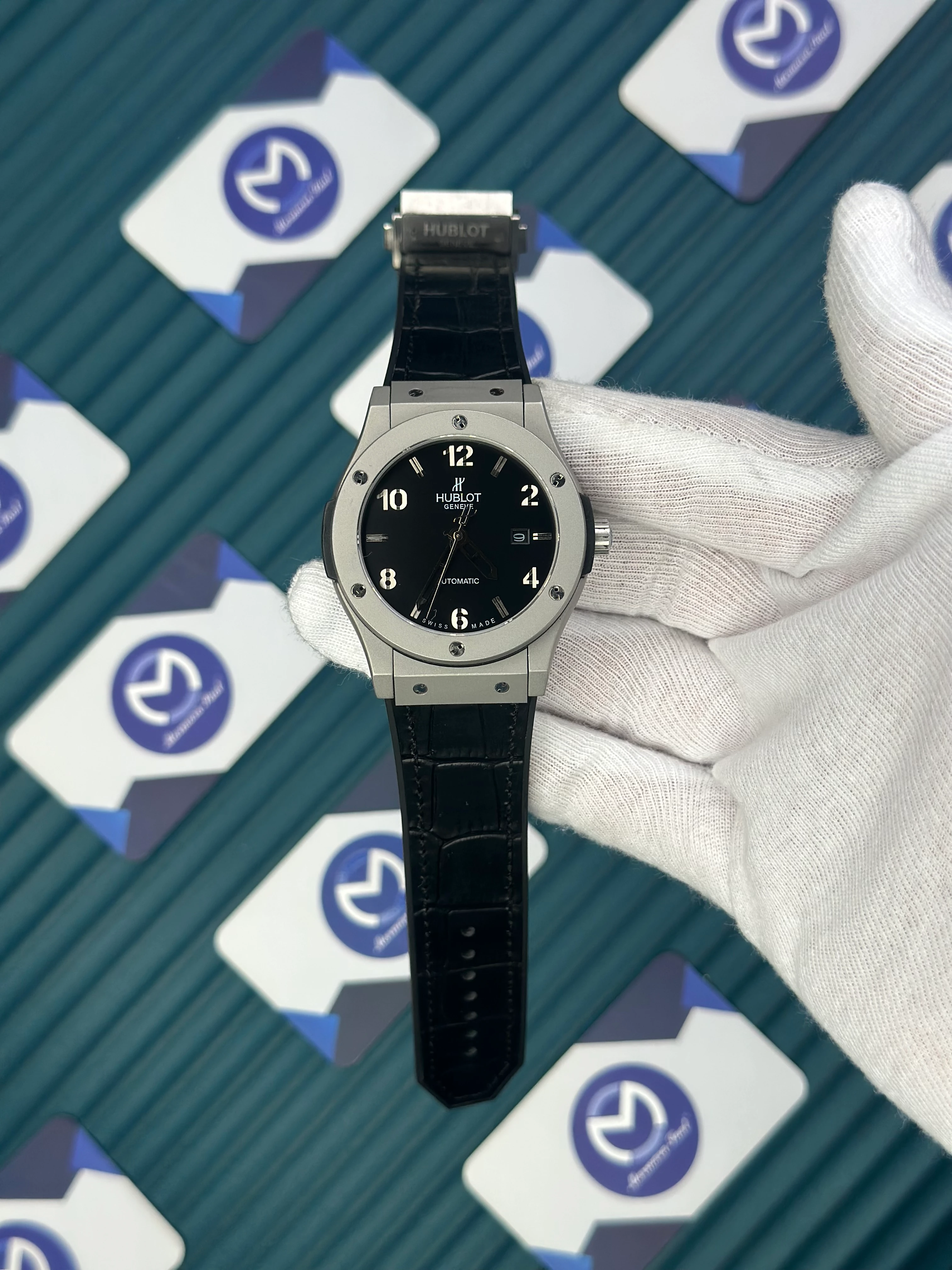 HUBLOT GENEVE AUTOMATIC BLACK DIAL GREY CASE BLACK LEATHER CORD 