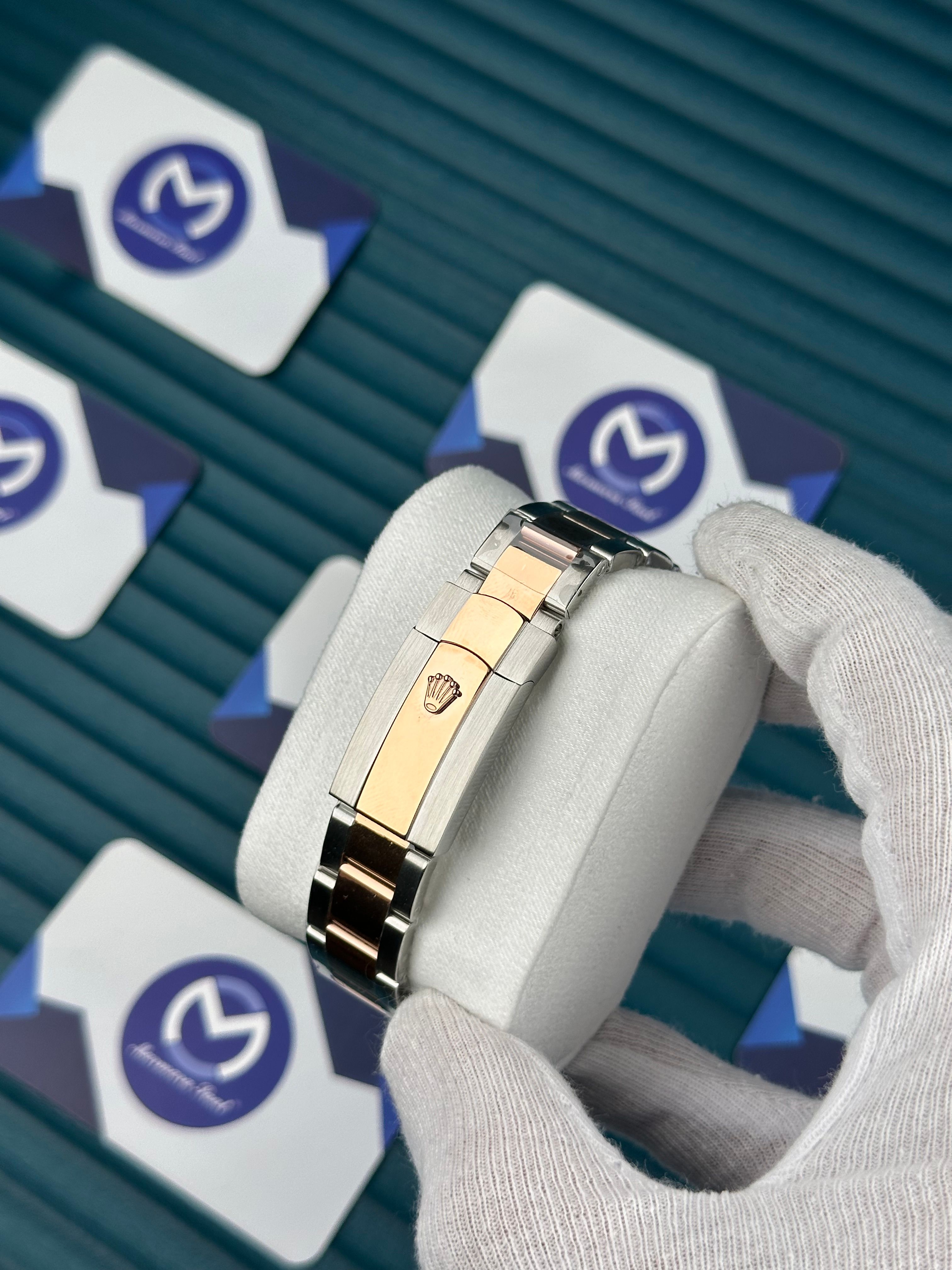 ROLEX DATEJUST OVAL BEZEL CHAMPAGNE DIAL ROSE-SILVER OYSTER