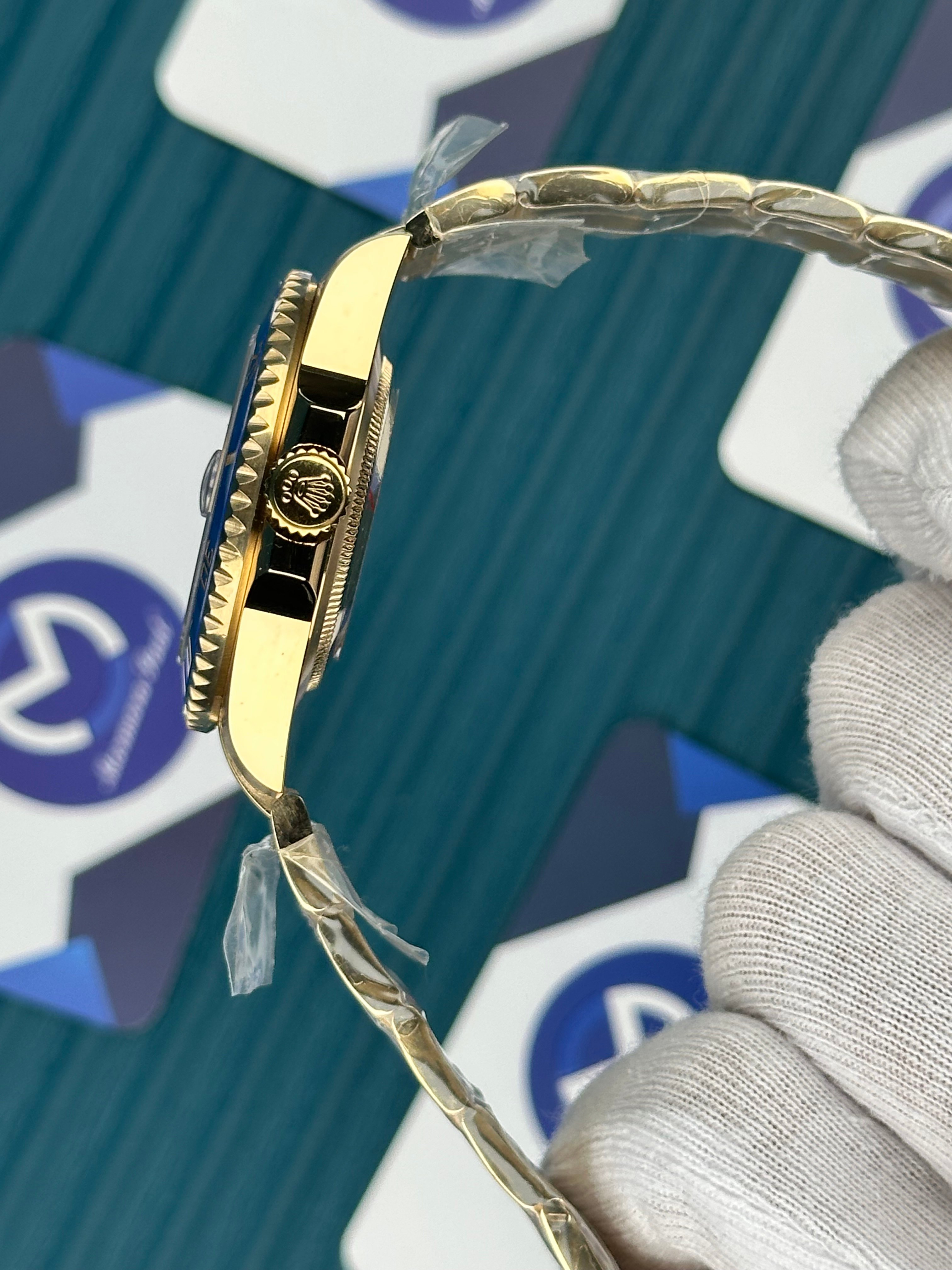 ROLEX SUBMARINER BLUE DIAL GOLD OYSTER