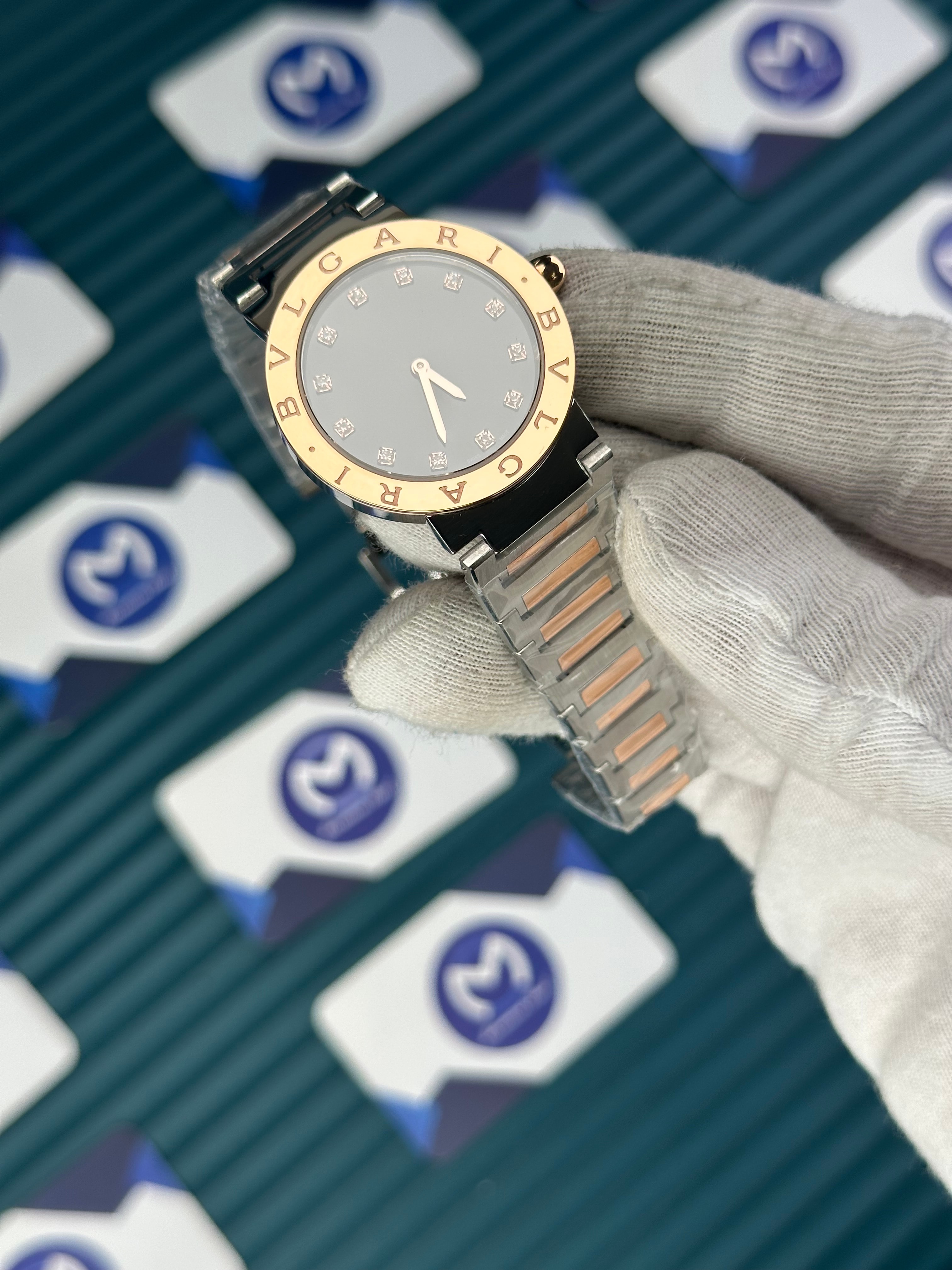 BVLGARI BLACK DIAL GOLD BEZEL DIAMOND INDEX GOLD-SILVER CORD