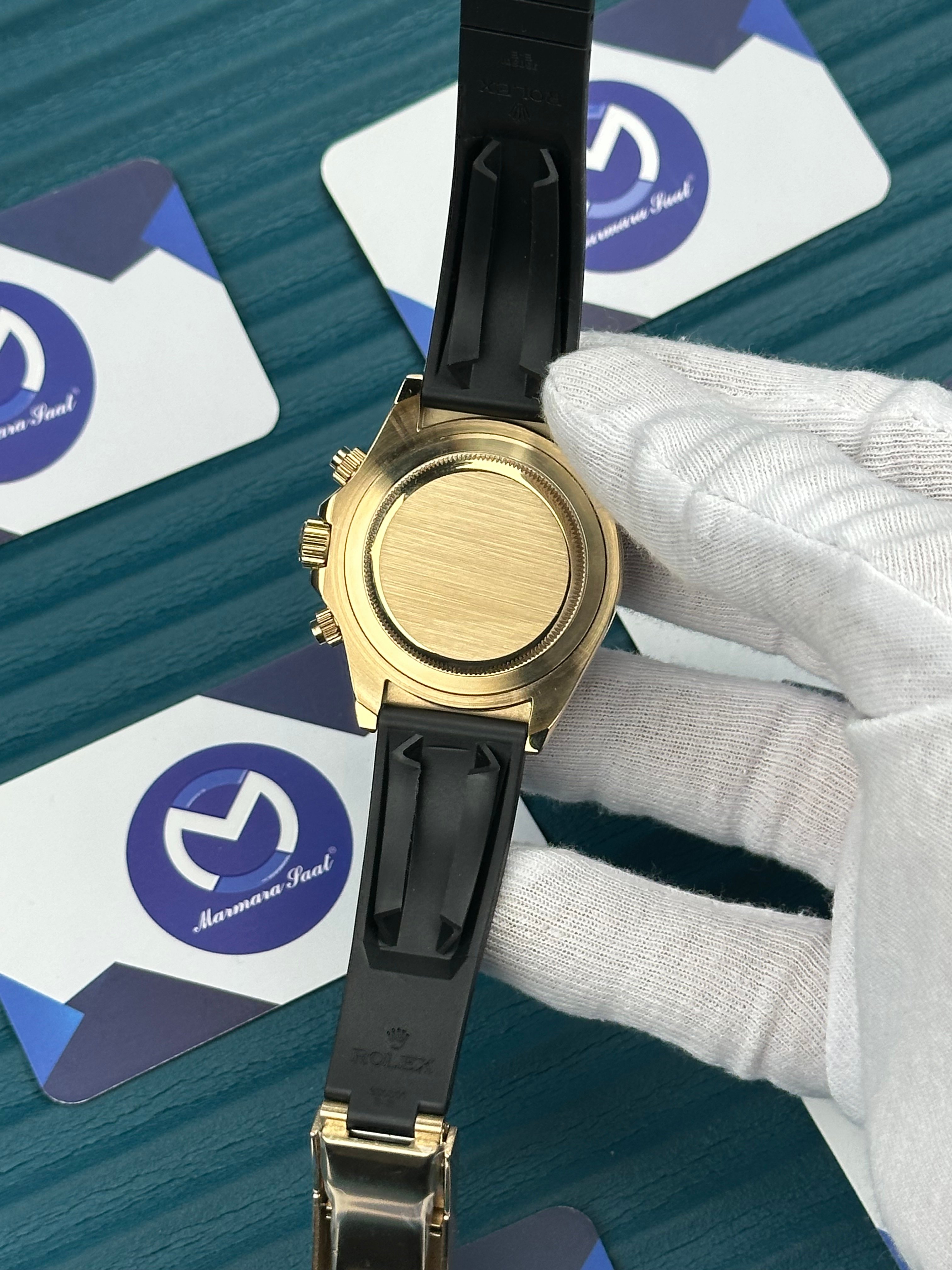 ROLEX DAYTONA CHAMPAGNE DIAL GOLD CASE OYSTERFLEX