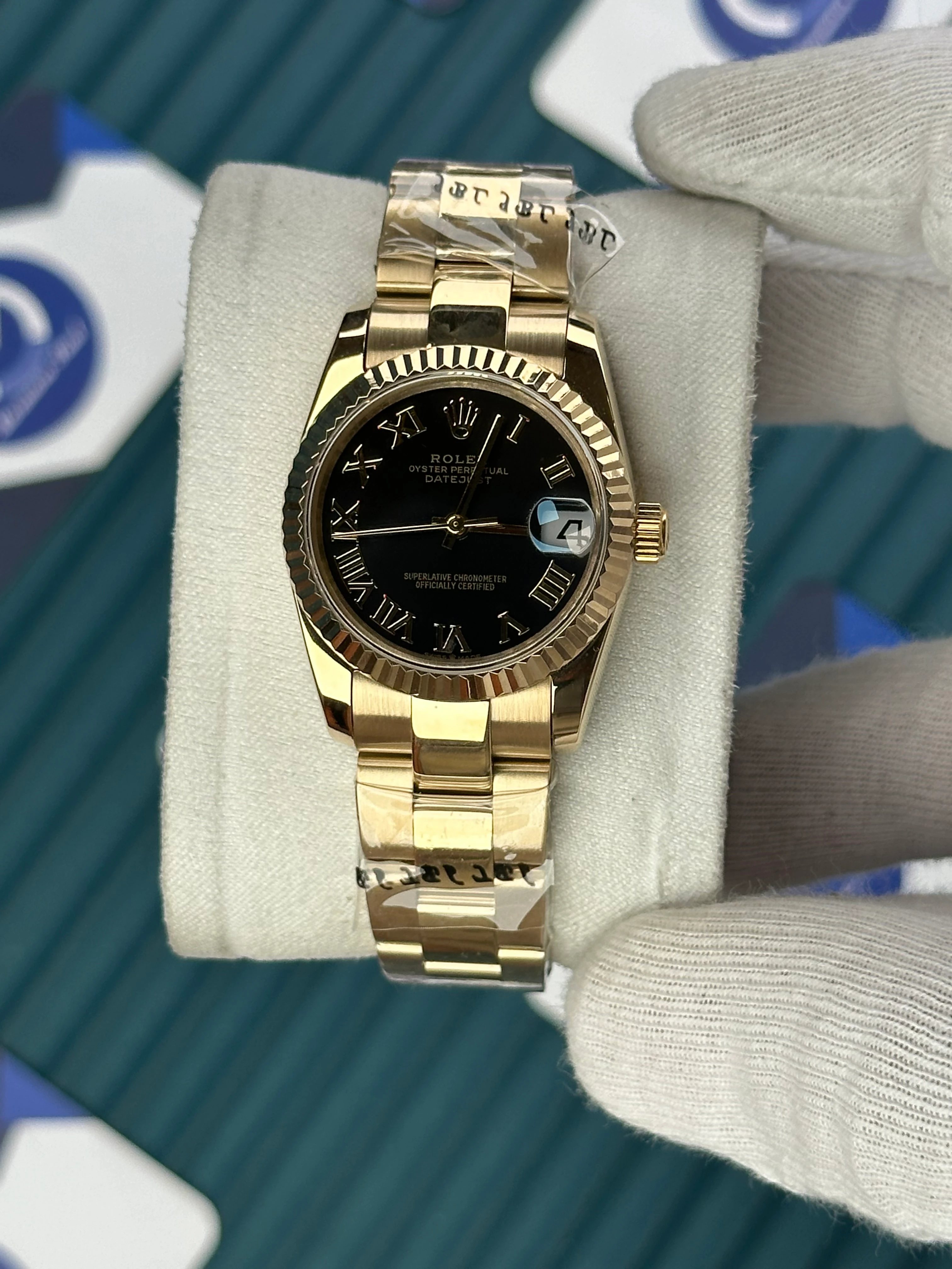 ROLEX 31 MM DATEJUST BLACK DIAL ROMA INDEX GOLD OYSTER 