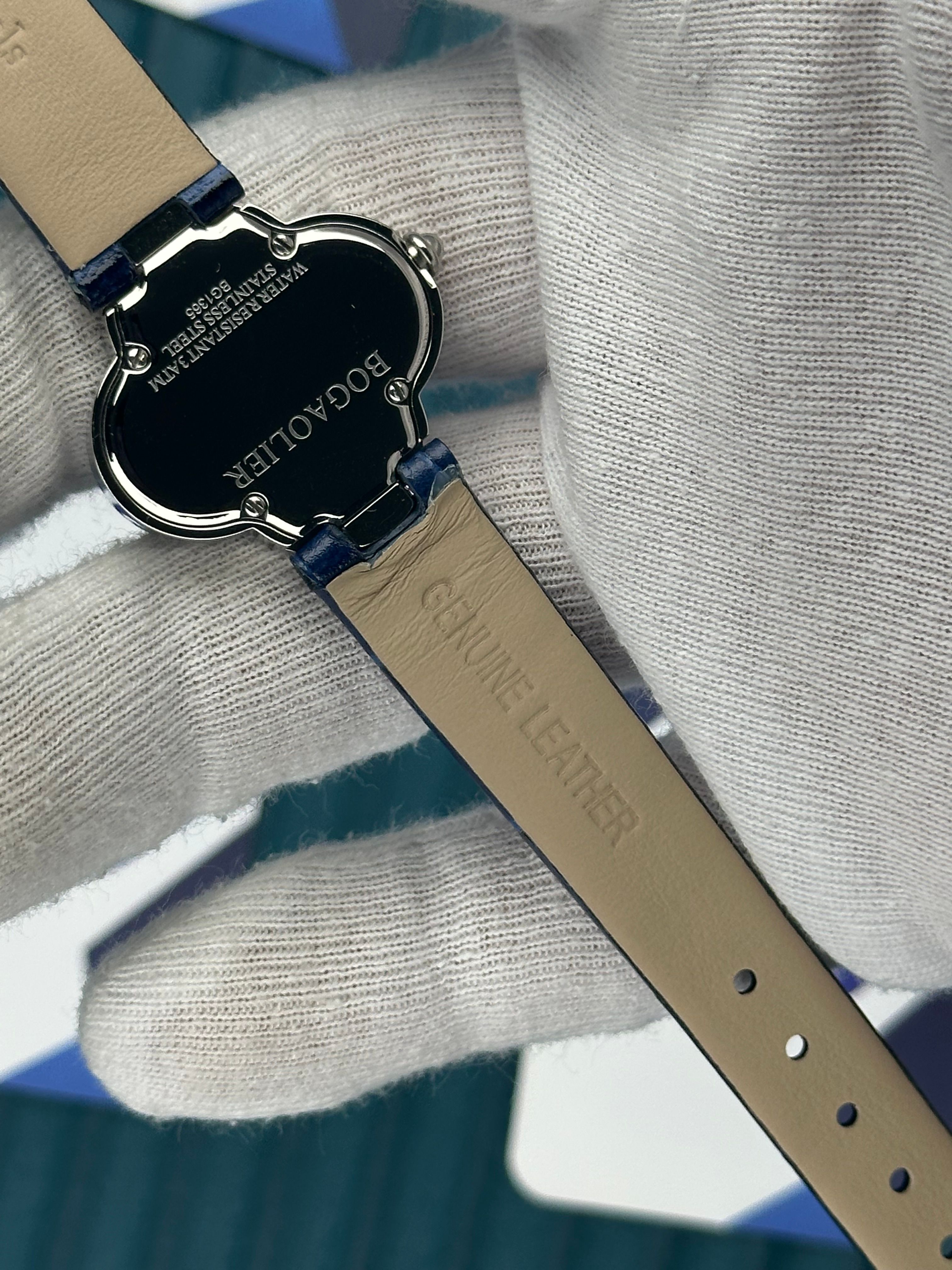 VAN CLEEF & ARPELS WHITE DIAL DIAMOND BEZEL SILVER CASE BLUE LEATHER CORD