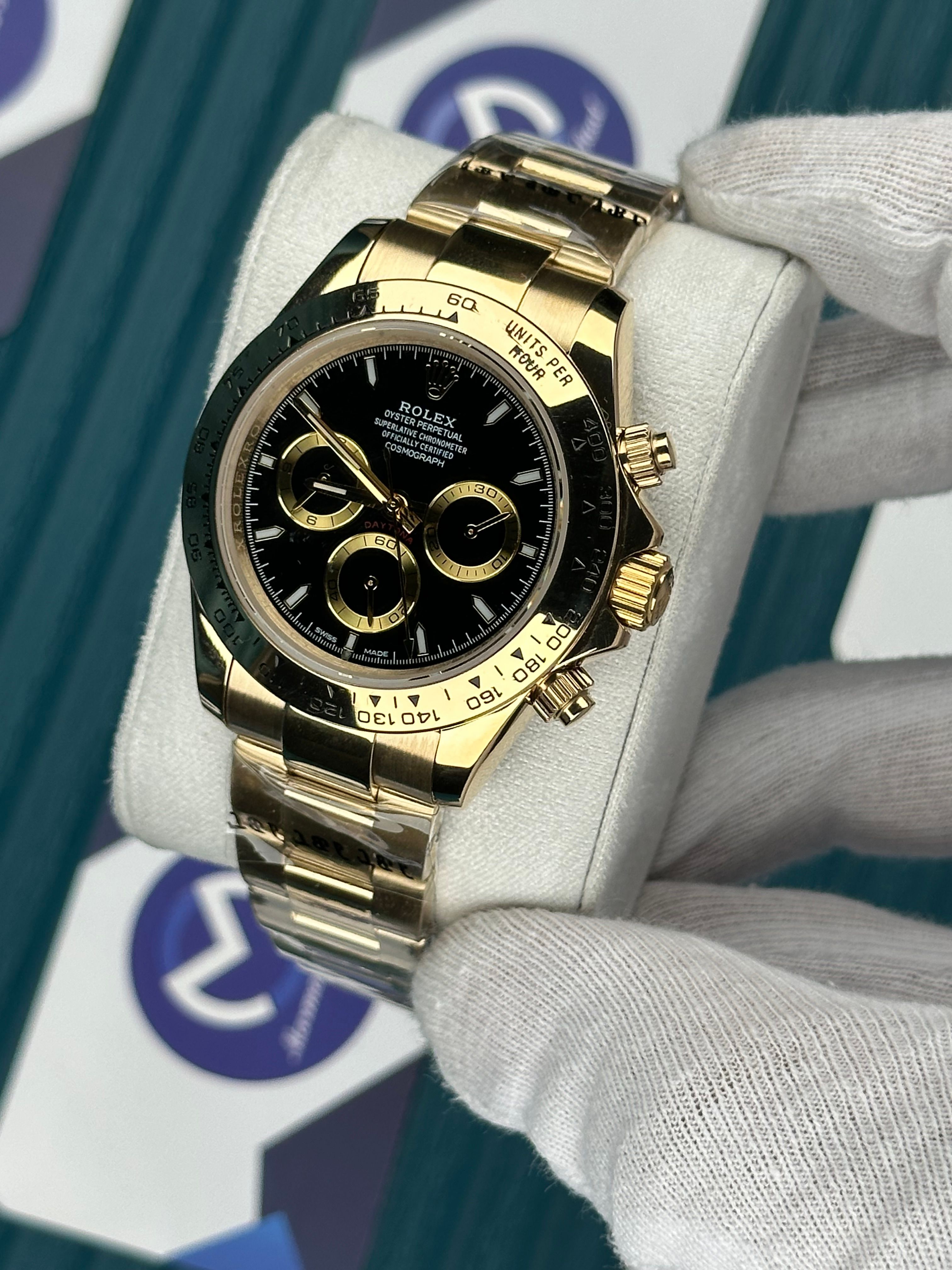 ROLEX DAYTONA BLACK DIAL OYSTER GOLD