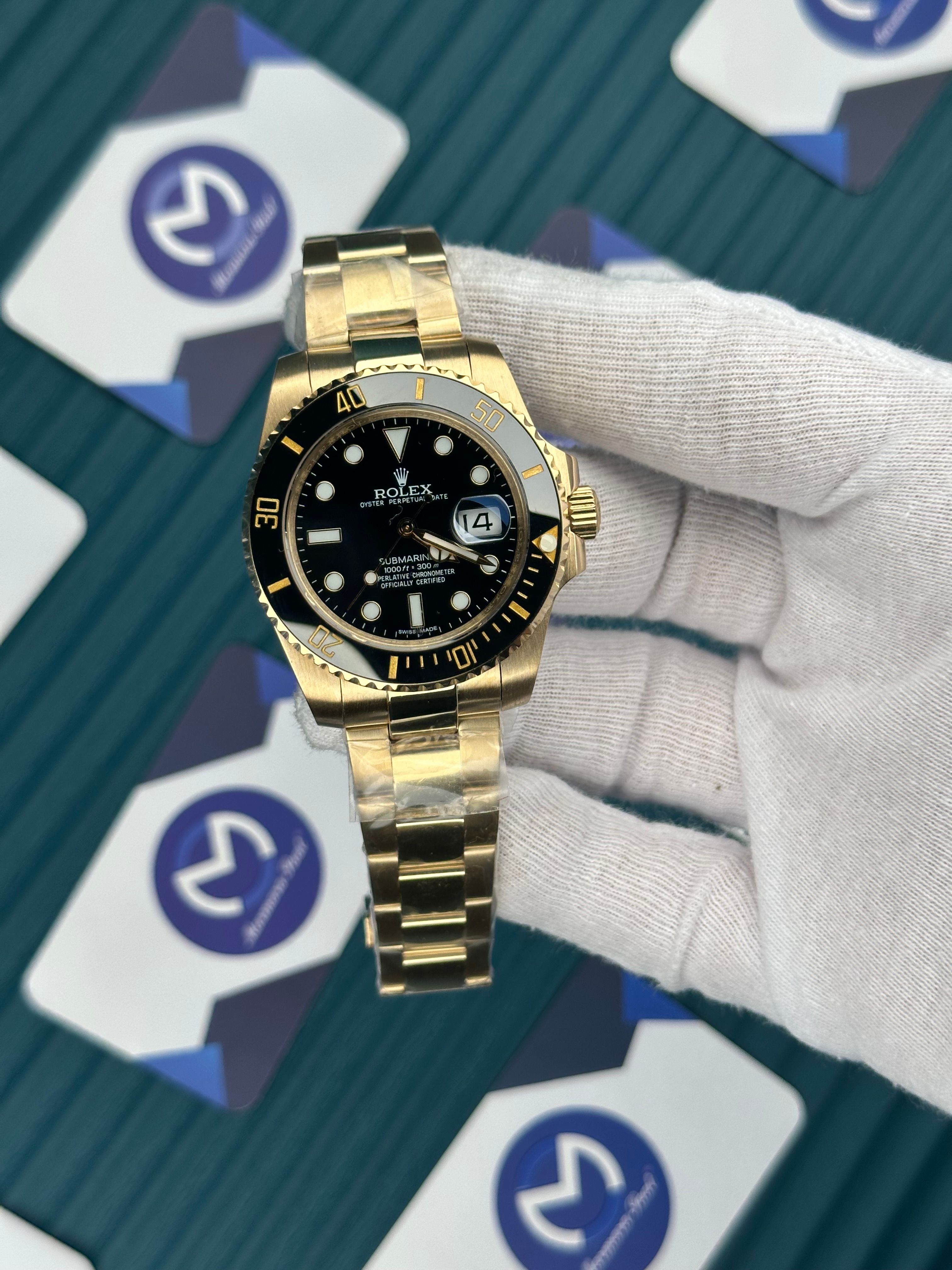 ROLEX SUBMARINER NLACK DIAL GOLD OYSTER