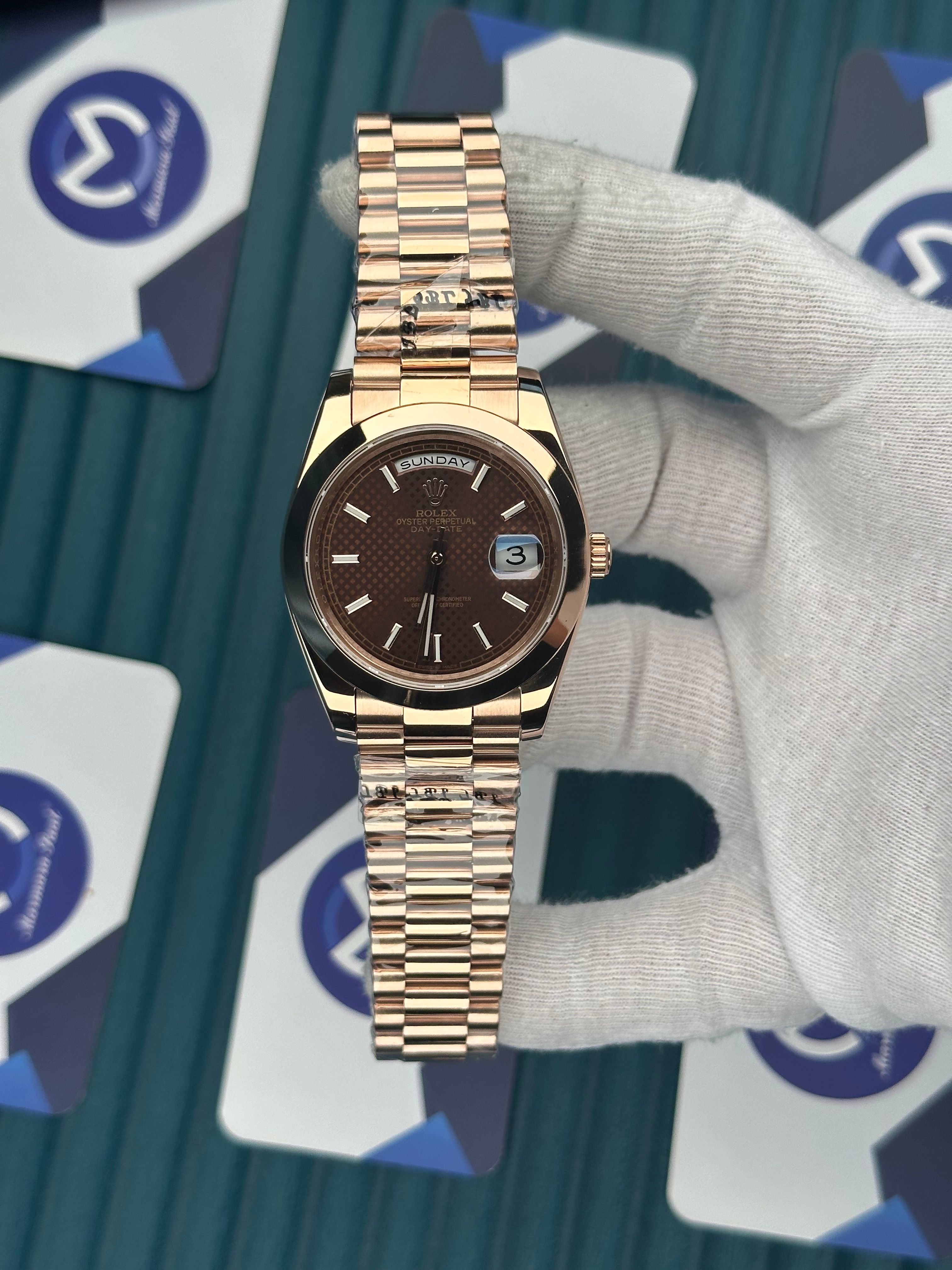 ROLEX DAY-DATE MOZAIK CHOCOLATE DIAL OVAL BEZEL ROSE PRESIDENT