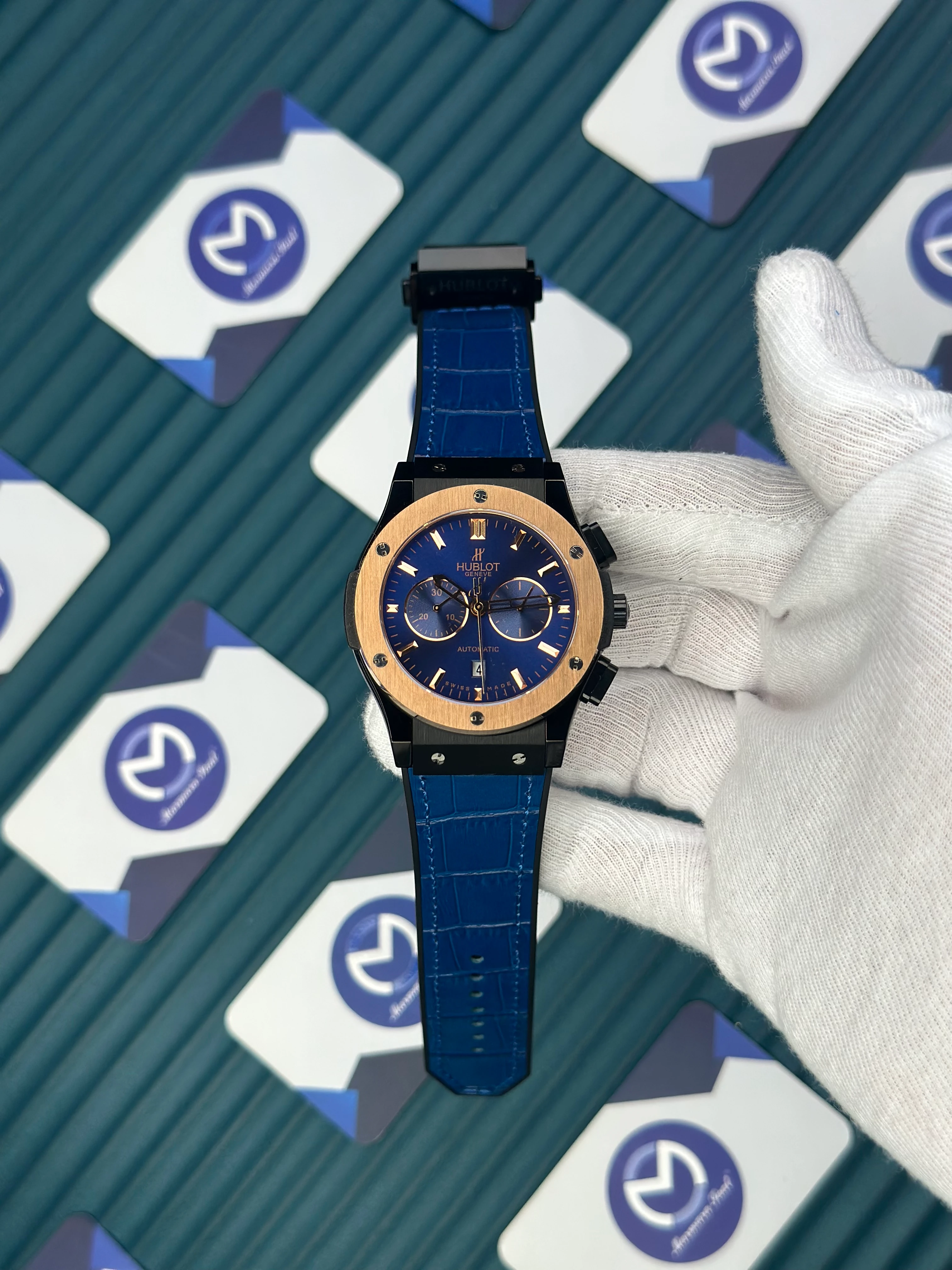 HUBLOT AUTOMATIC NAVY BLUE CHRONOGRAPH ROSE CASE BLACK CASE BLUE LEATHER CORD 