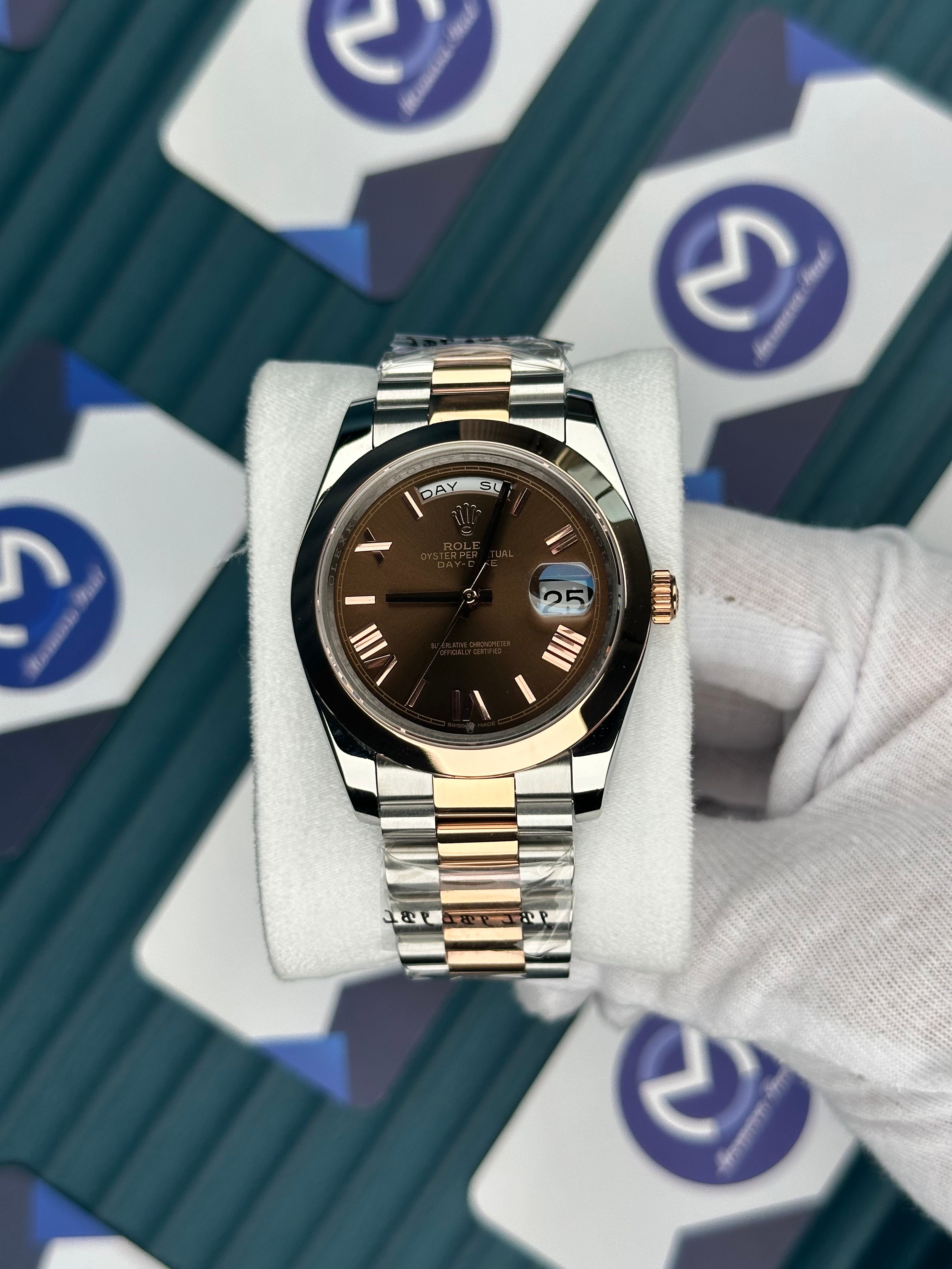 ROLEX DAY-DATE CHOCOLATE OVAL BEZEL ROSE-SILVER PRESIDENT