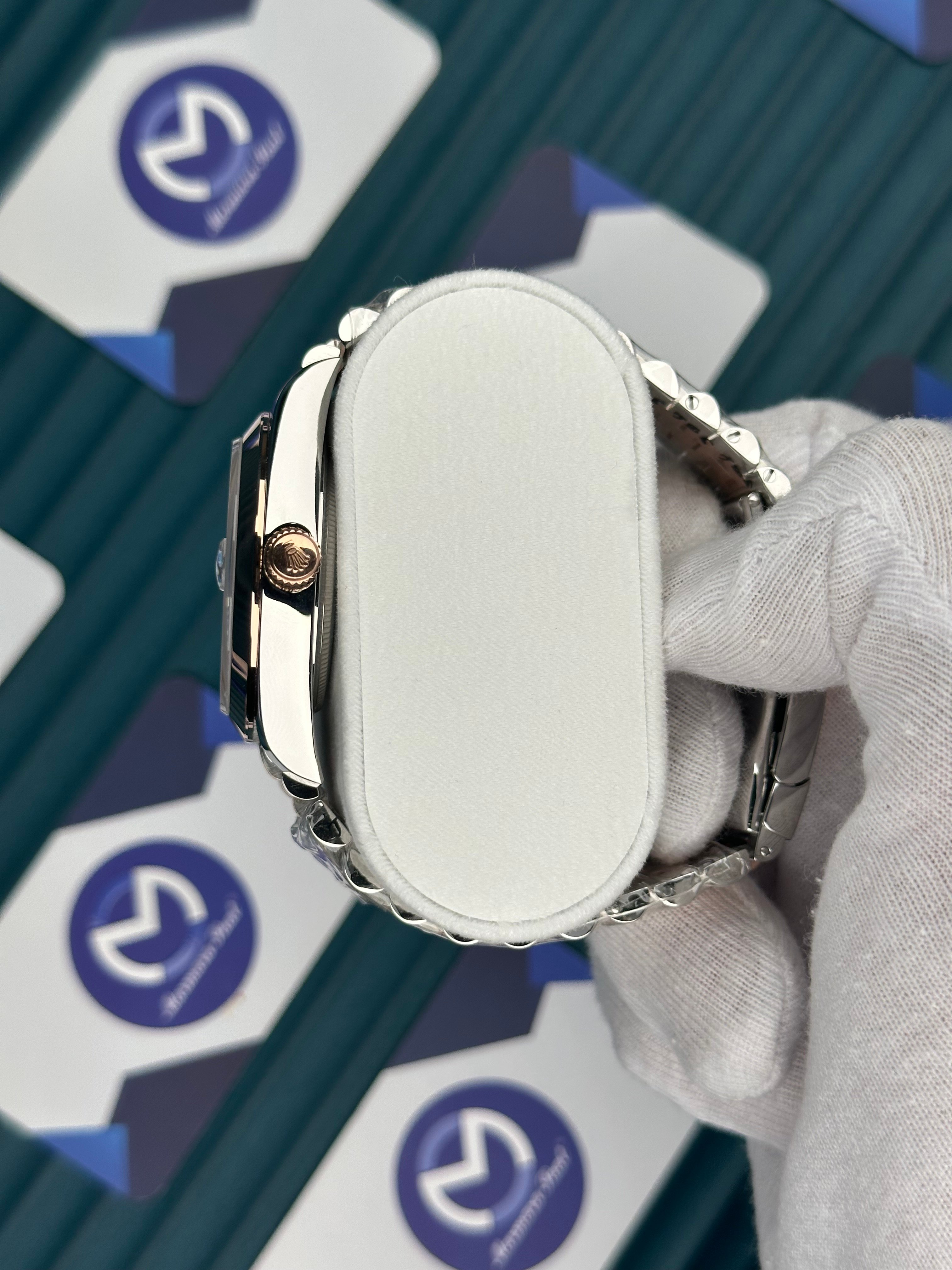 ROLEX DAY-DATE GREEN DIAL ROMA INDEX OVAL BEZEL ROSE-SILVER JUBILE