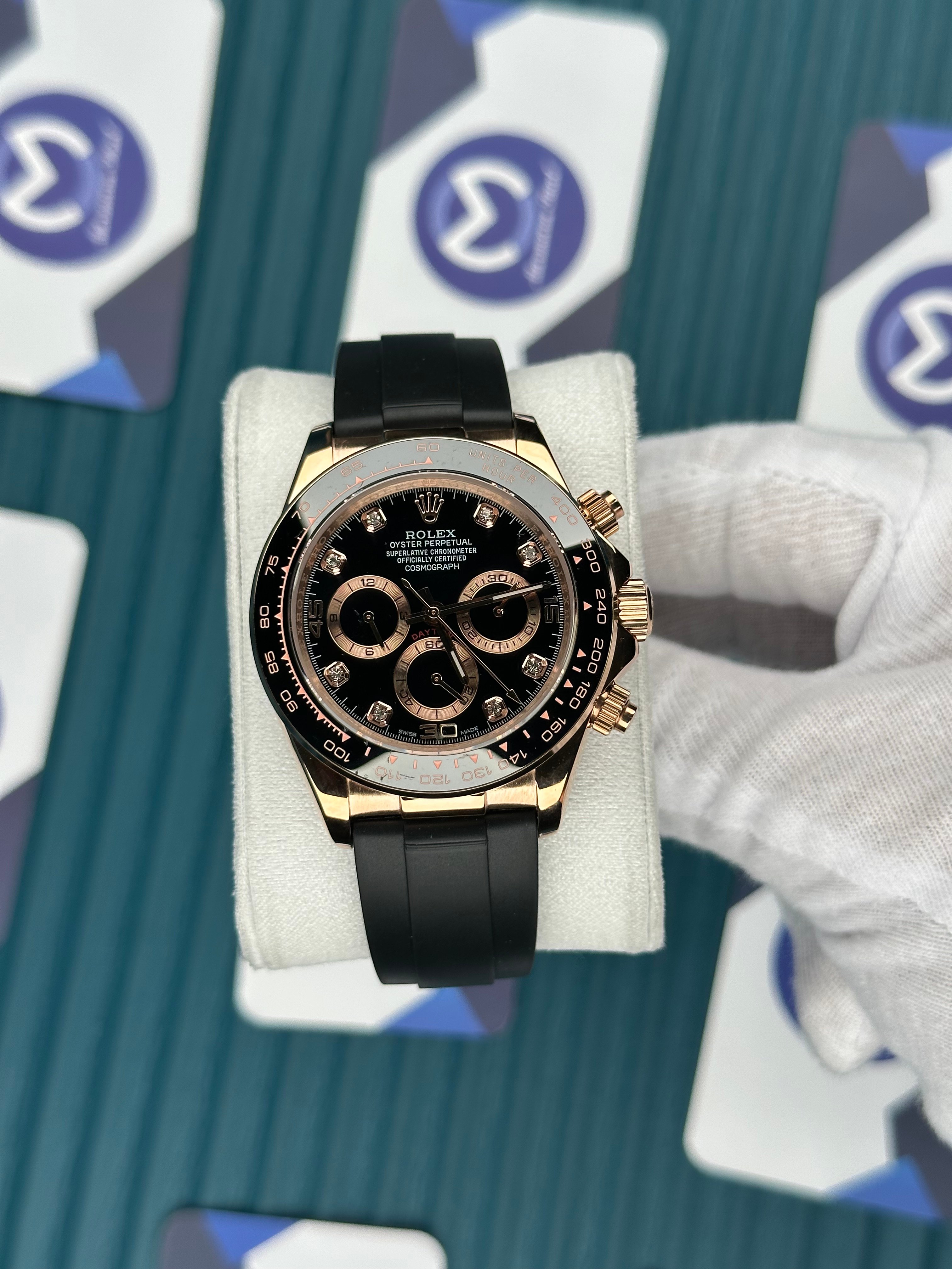 ROLEX DAYTONA BLACK DIAL DIAMOND INDEX ROSE CASE OYSTERFLEX