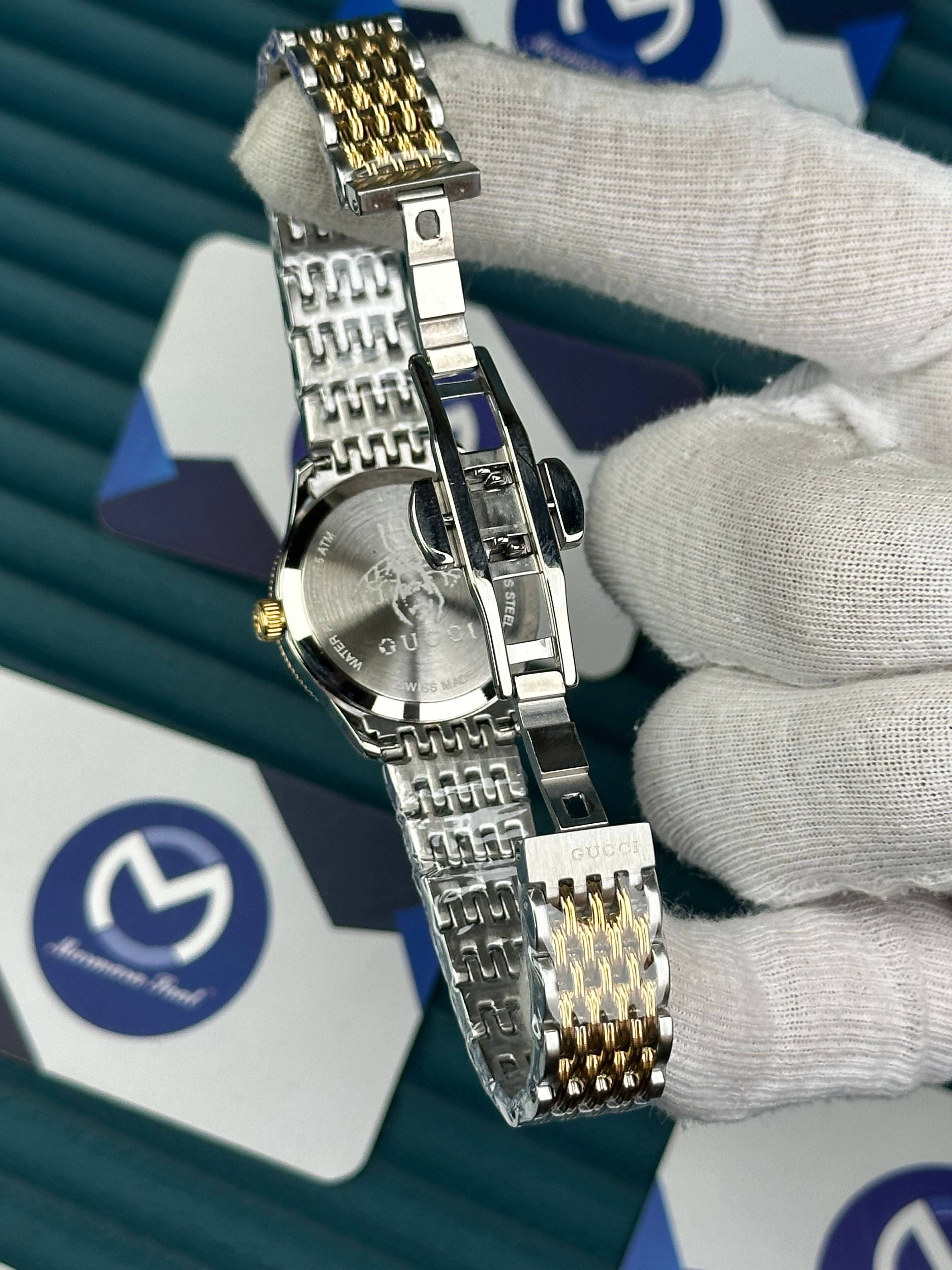 GUCCI PINK DIAL SPINNING BUTTERFLY GOLD-SILVER