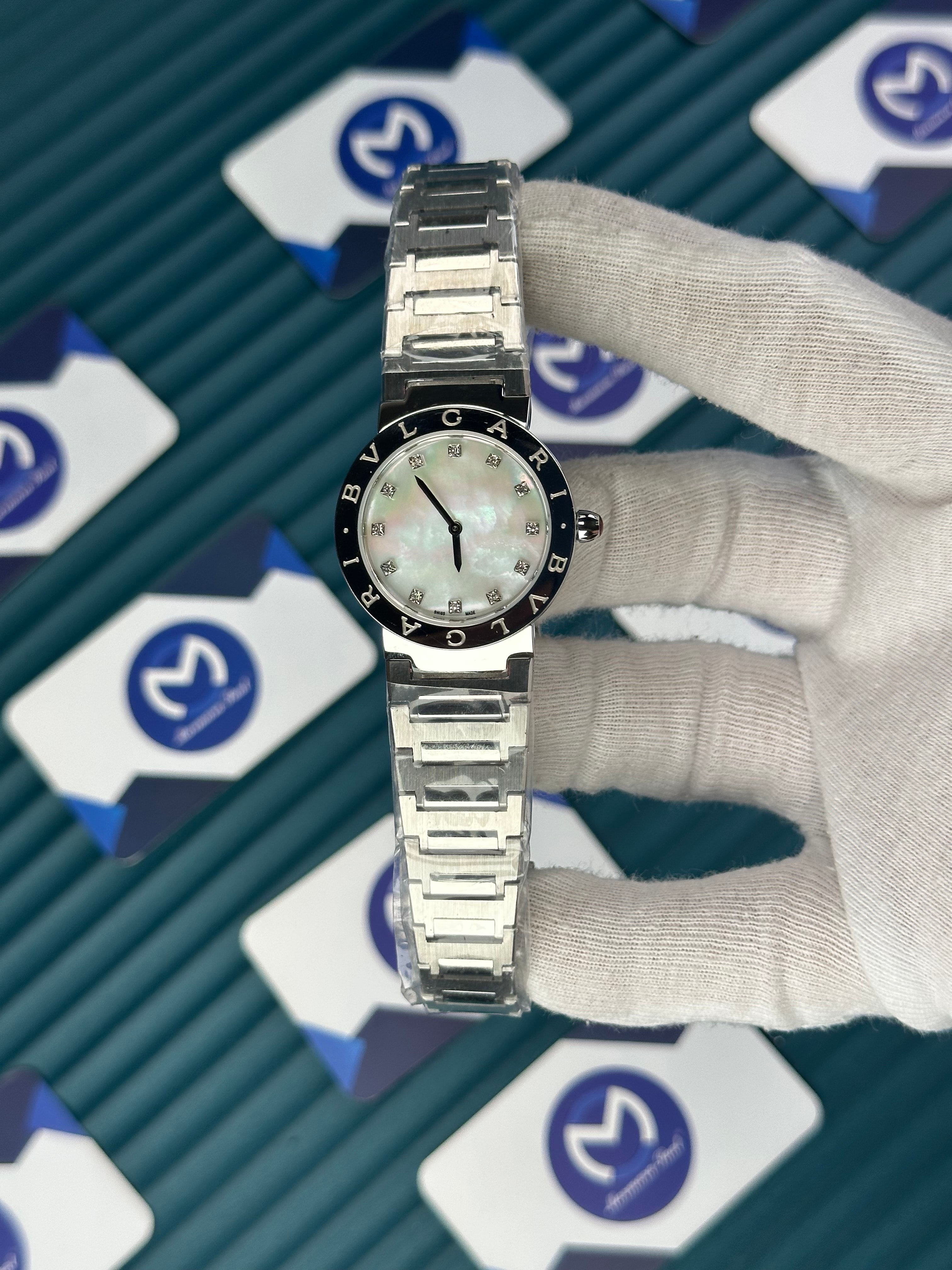 BVLGARI PEARLESCENT WHITE DIAL SILVER BEZEL DIAMOND INDEX SILVER CORD
