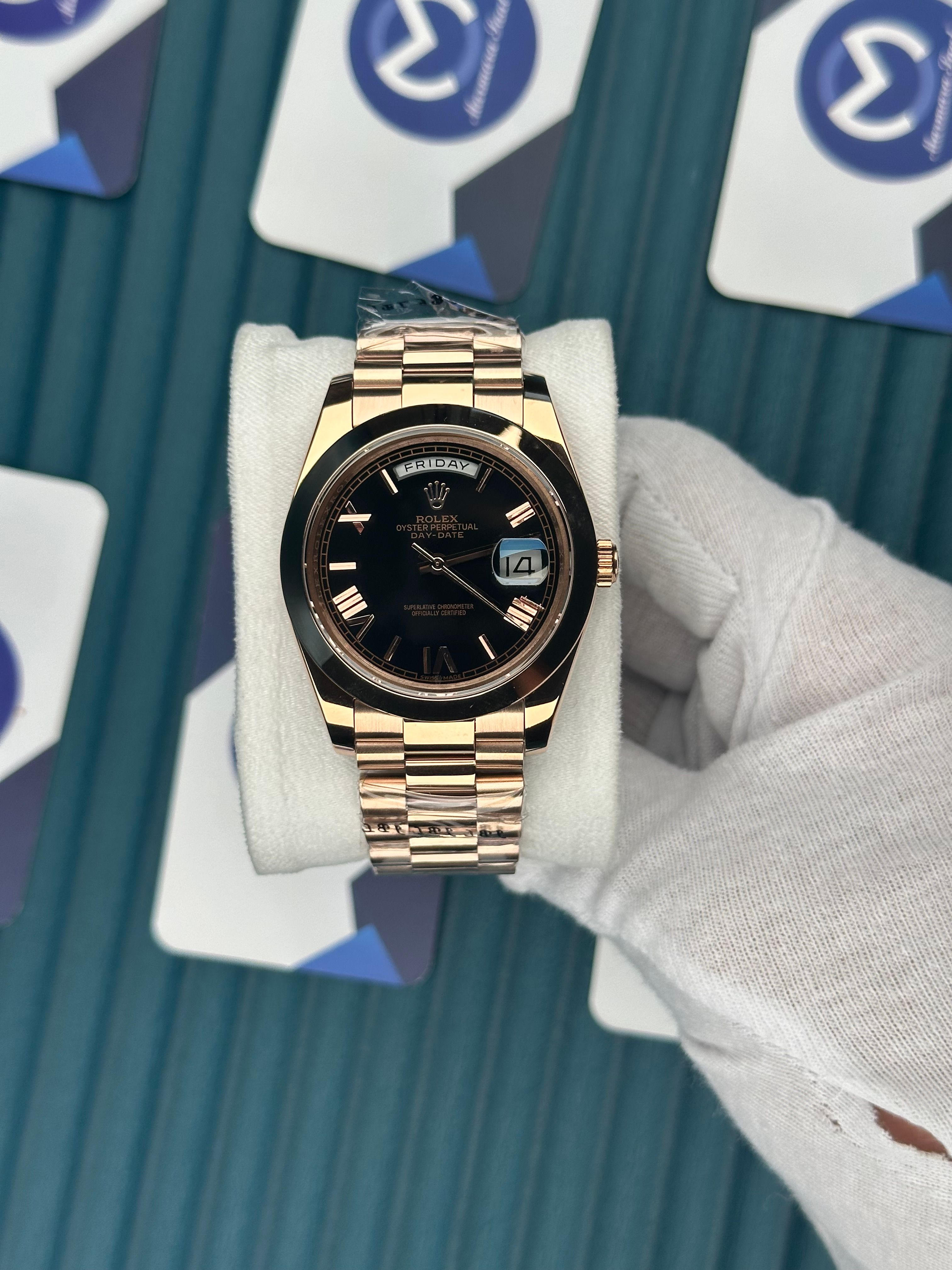 ROLEX DAY-DATE BLACK DIAL OVAL BEZEL ROSE PRESIDENT