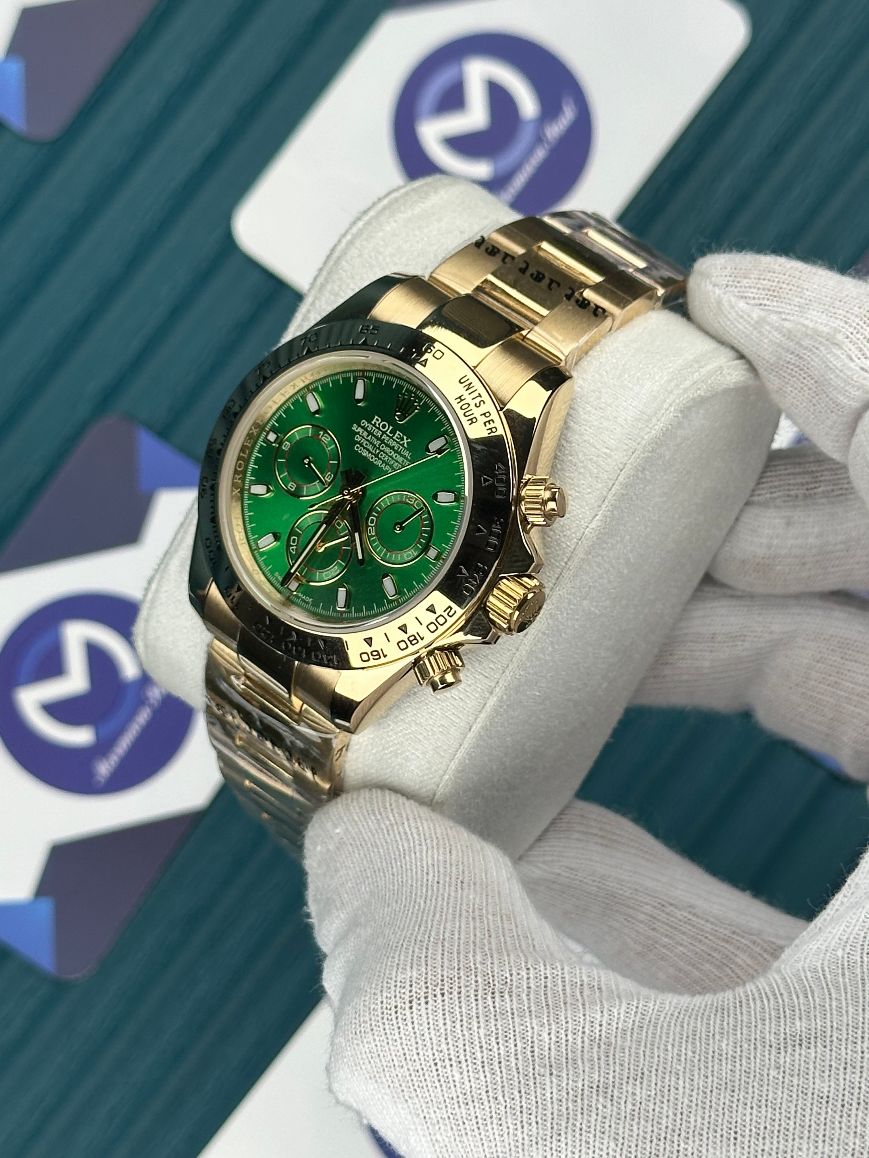 ROLEX DAYTONA GREEN DIAL GOLD OYSTER